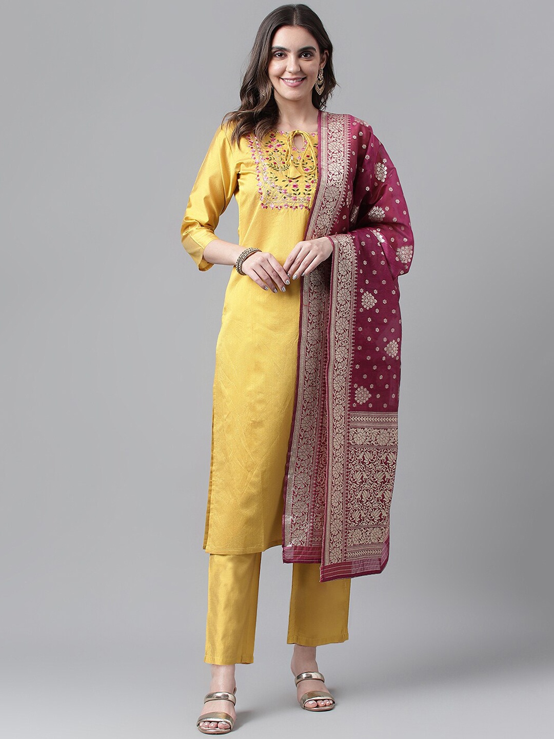 

RAJGRANTH Yellow & Pink Yoke Design Tie Up Neck Thread Work Kurta With Trousers & Dupatta