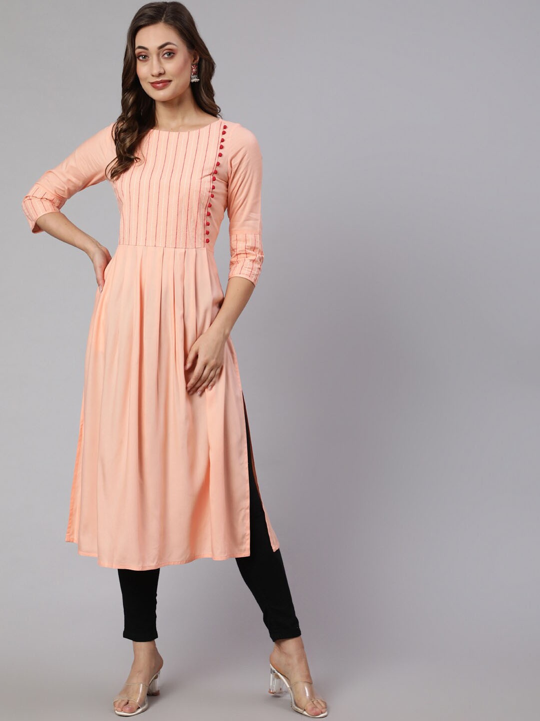 

Jaipur Kurti Peach-Coloured Yoke Design Thread Work Kurta