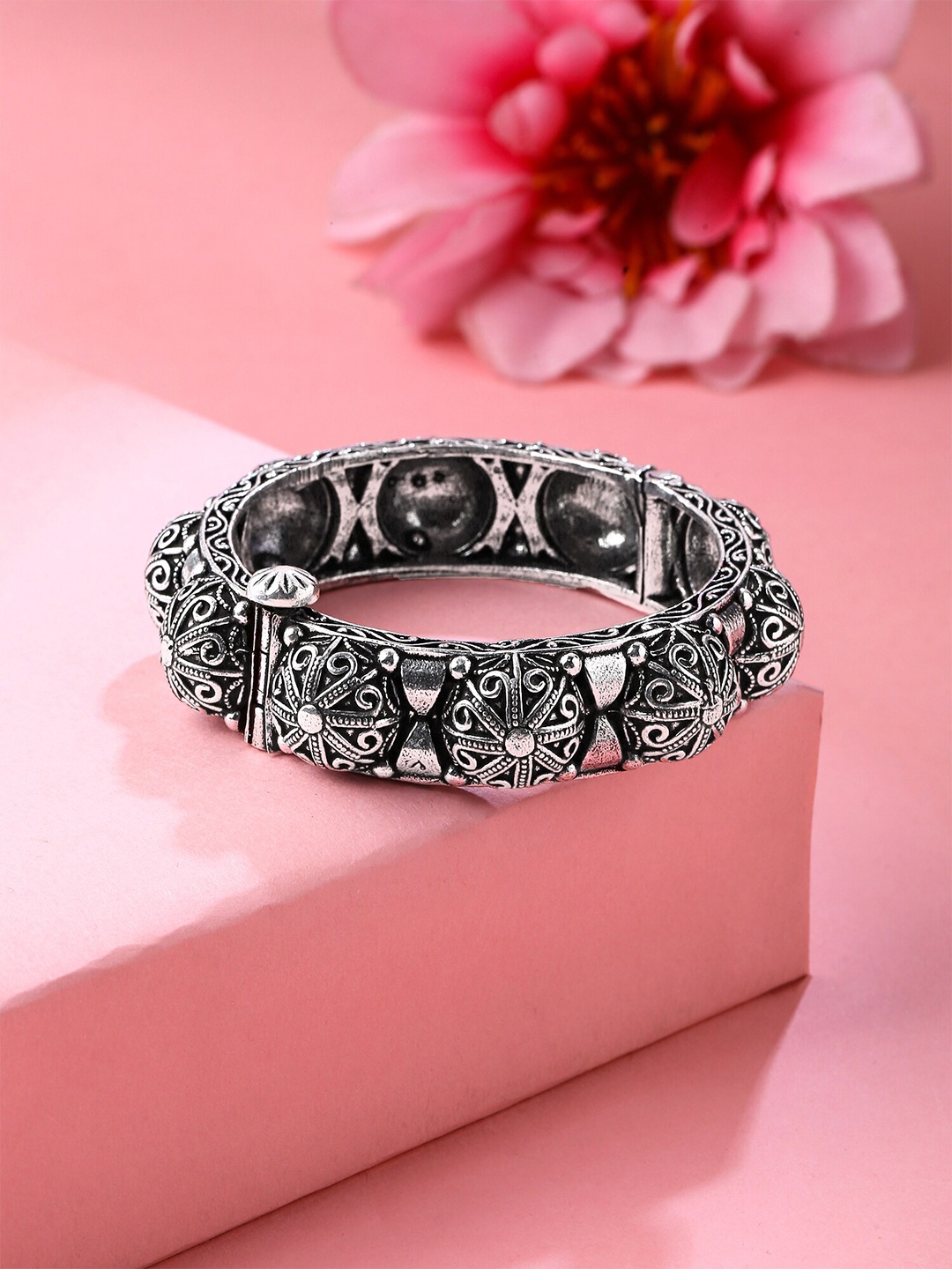 

Yellow Chimes Women German Silver Plated Oxidised Bangle-Style Bracelet