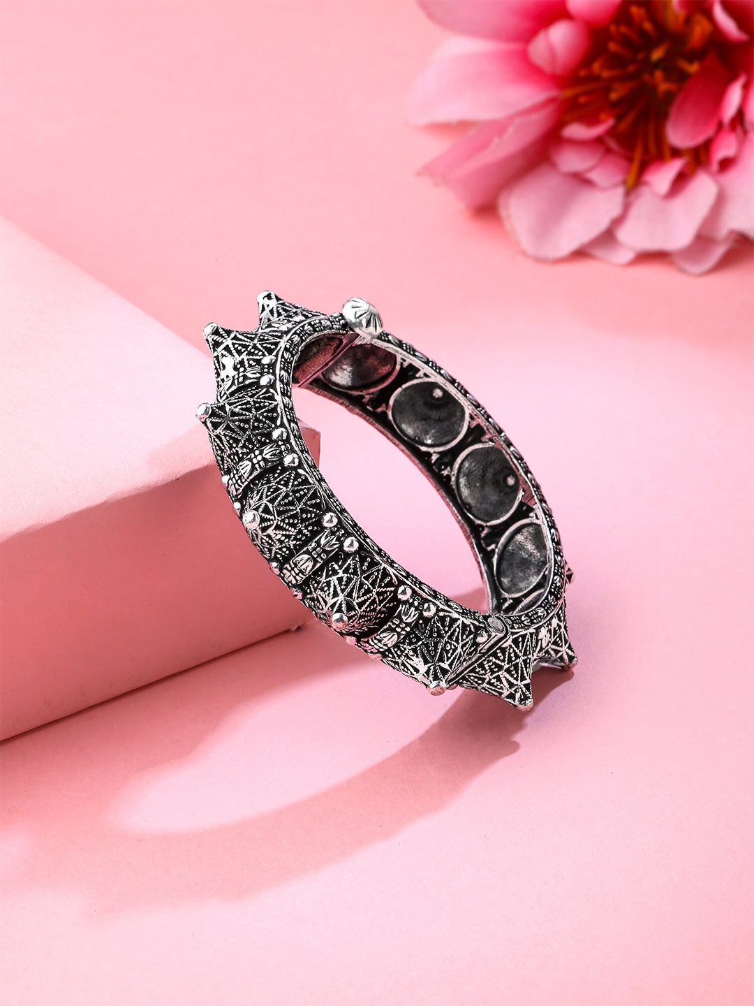 

Yellow Chimes Women German Silver Oxidised Bangle-Style Bracelet
