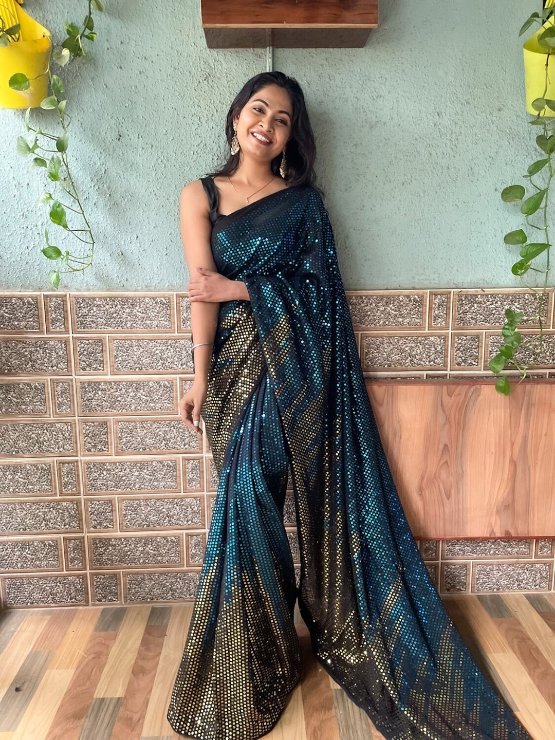 

Mitera Teal Blue & Gold-Toned Sequin Embellished Saree