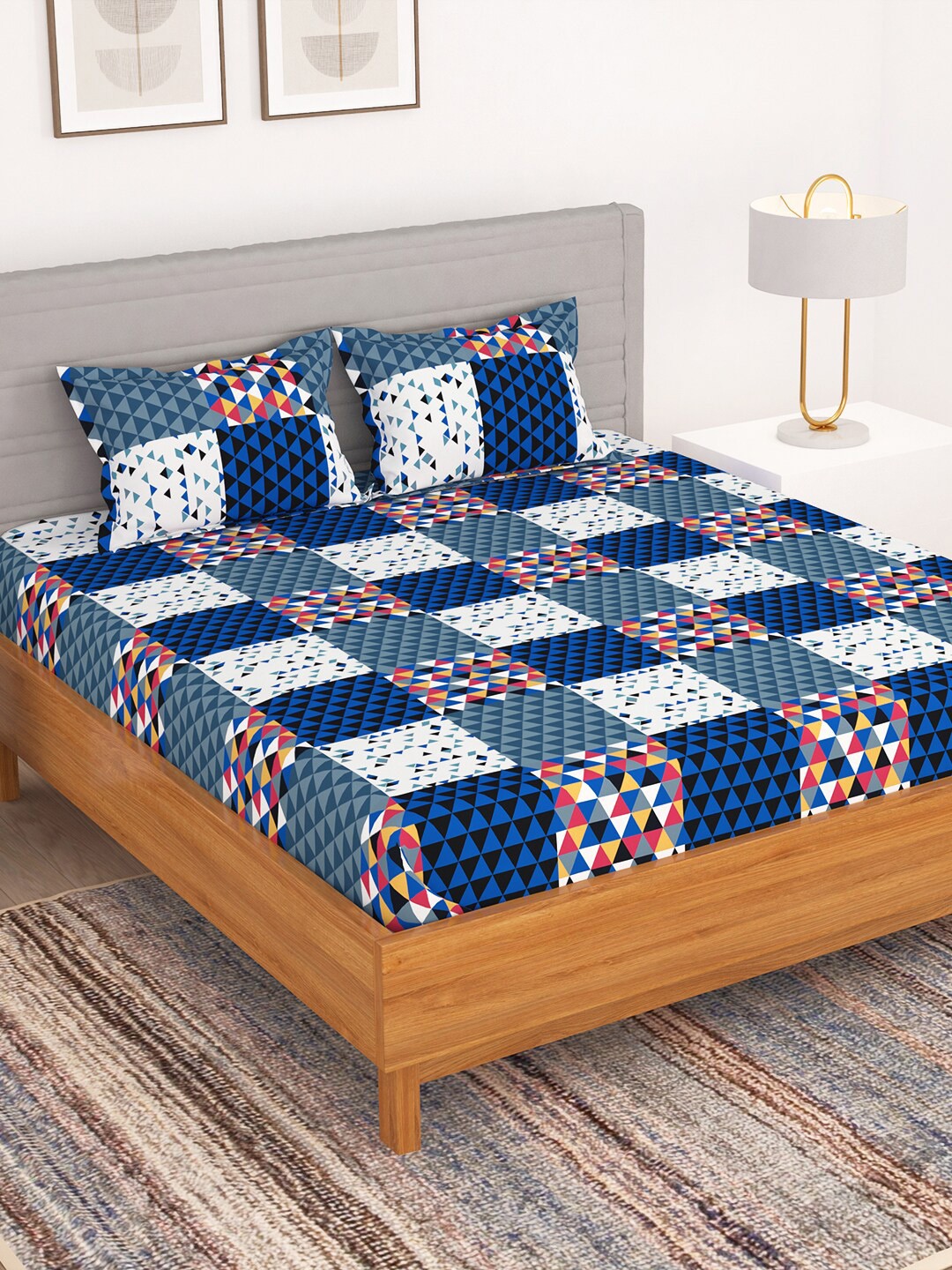 

Bedspun Blue & White Geometric 150 TC Queen Bedsheet With 2 Pillow Covers