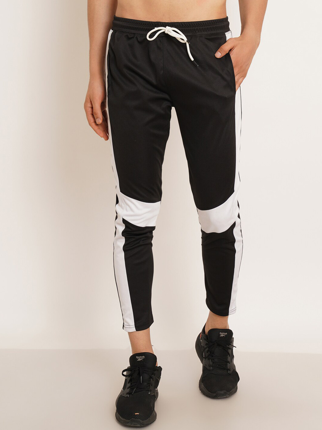 

Kushi Flyer Men Colourblocked Mid-Rise Side Pockets Sports Track Pants, Black