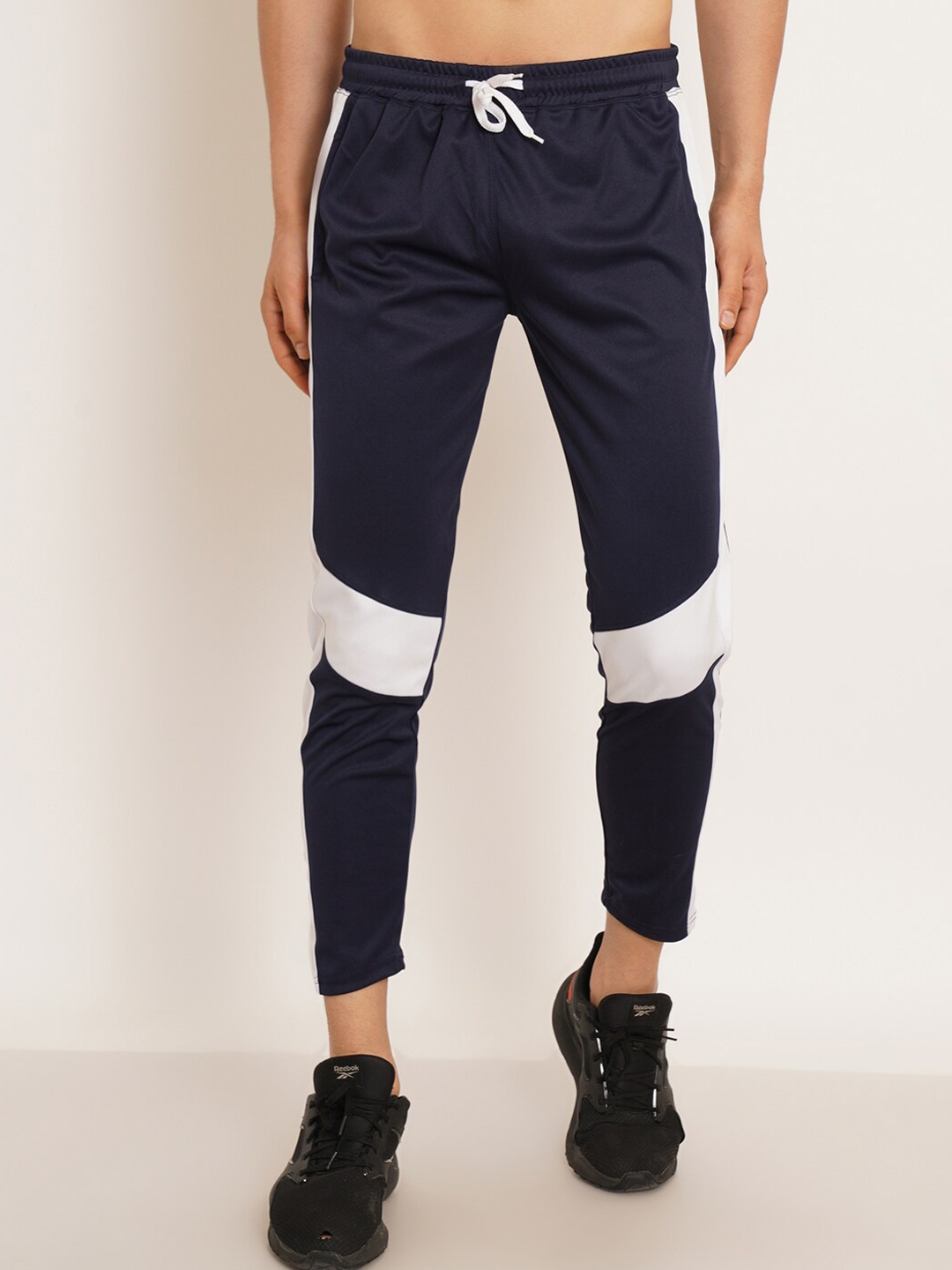 

Kushi Flyer Men Colourblocked Mid-Rise Side Pockets Sports Track Pants, Navy blue