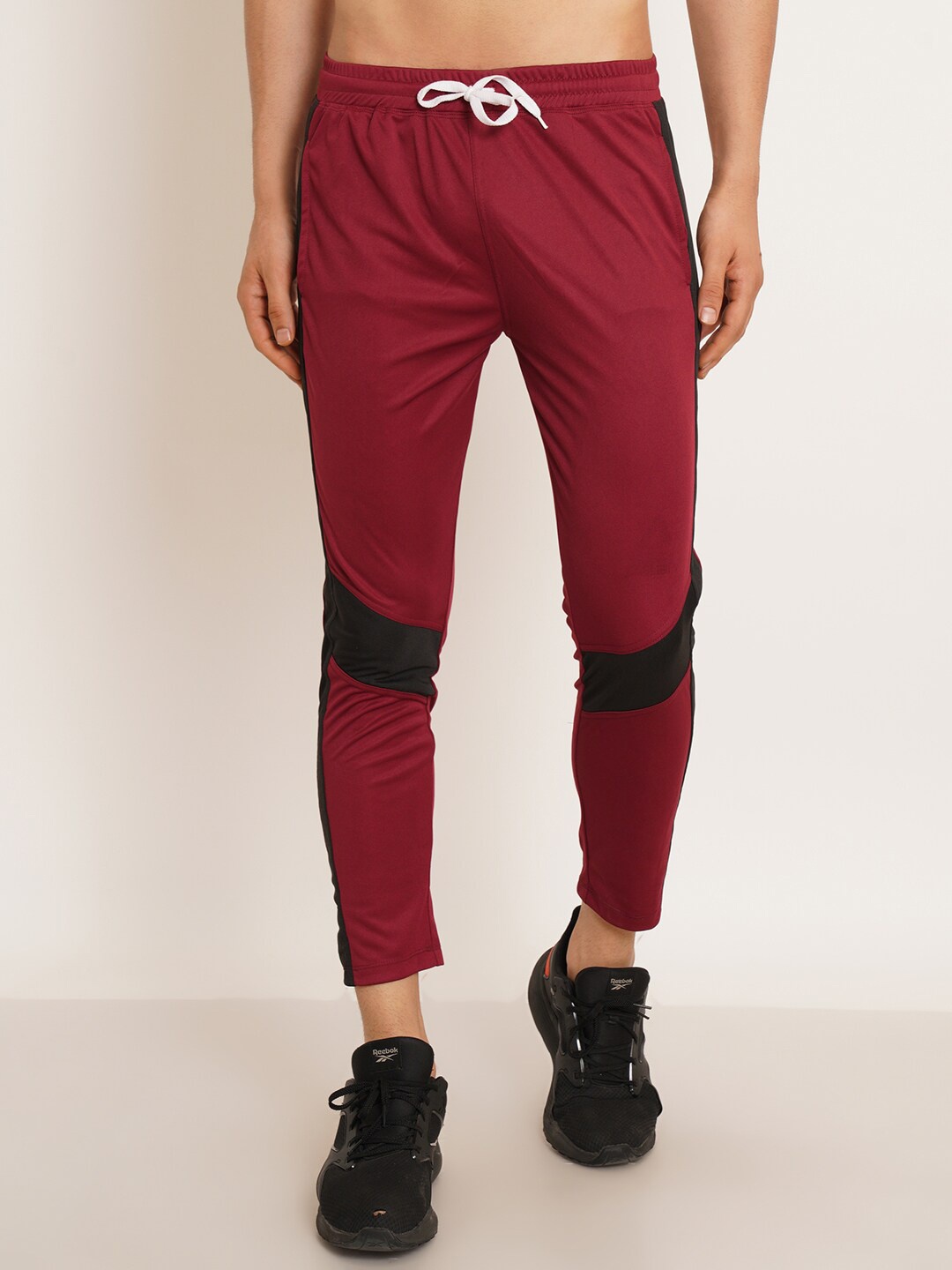 

Kushi Flyer Men Colourblocked Mid-Rise Side Pockets Sports Track Pants, Maroon