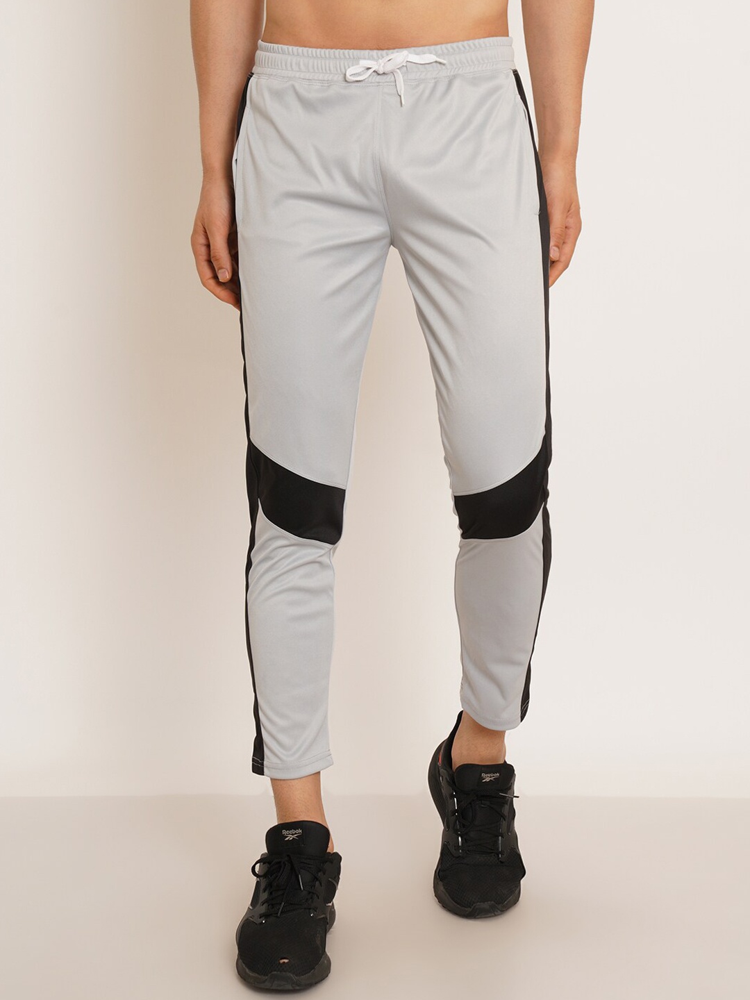 

Kushi Flyer Men Colourblocked Mid-Rise Side Pockets Sports Track Pants, Grey