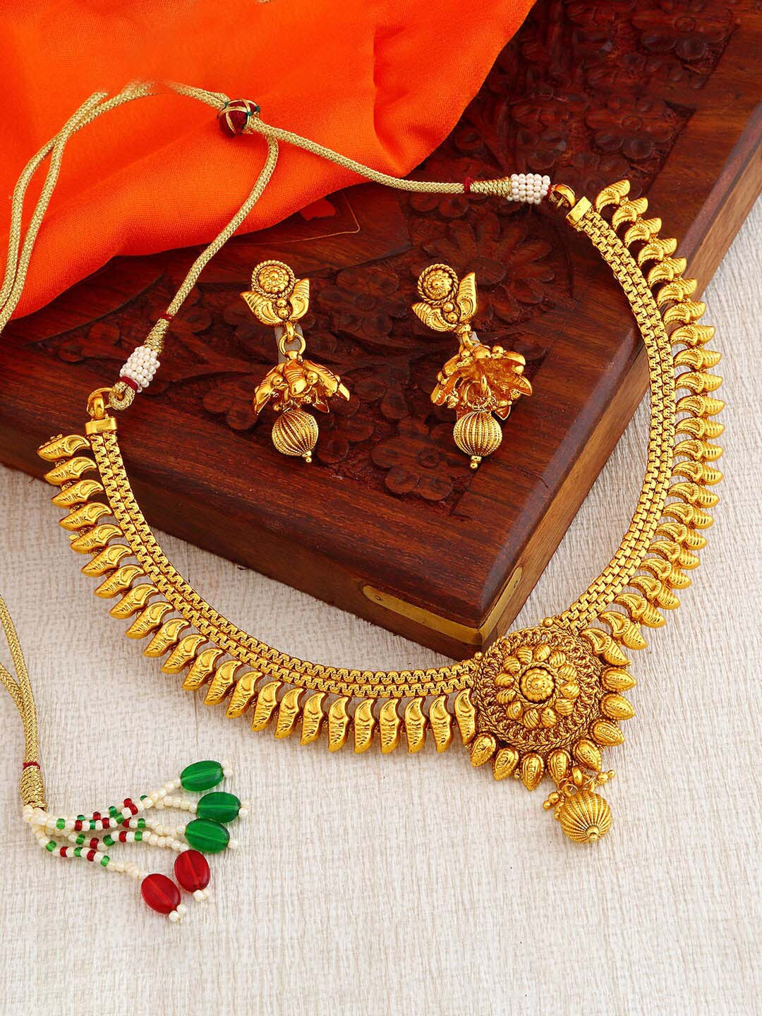 

Sukkhi Gold-Plated Necklace & Earrings