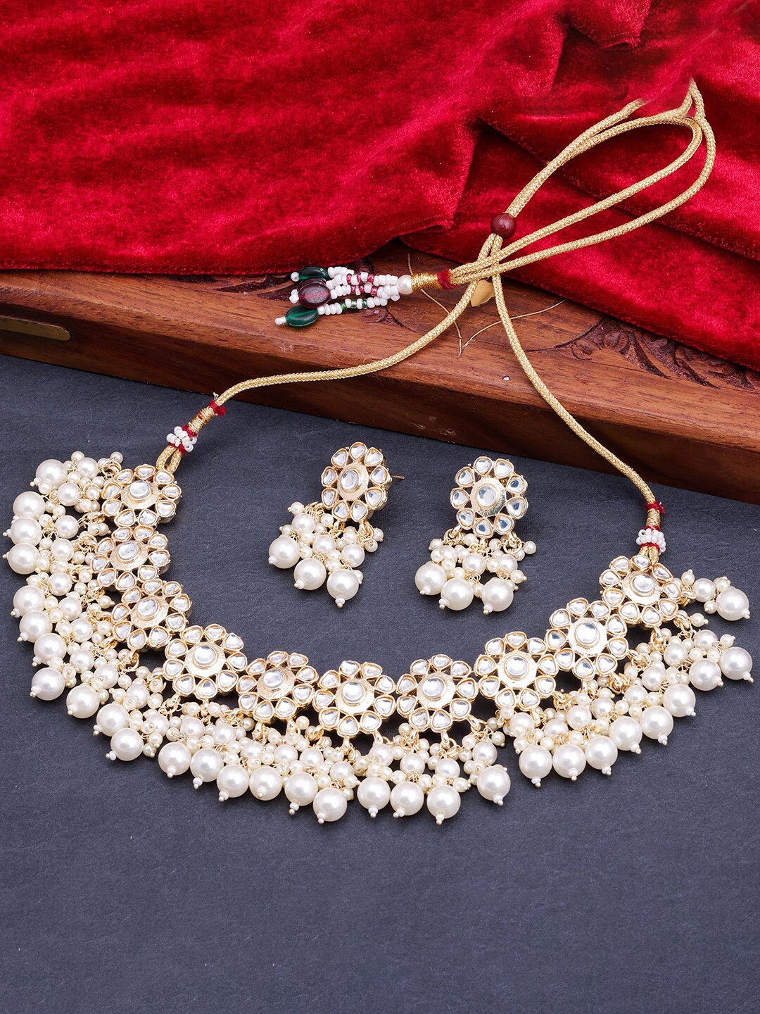 

Sukkhi Gold-Plated Stone-Studded & Beaded Jewellery Set