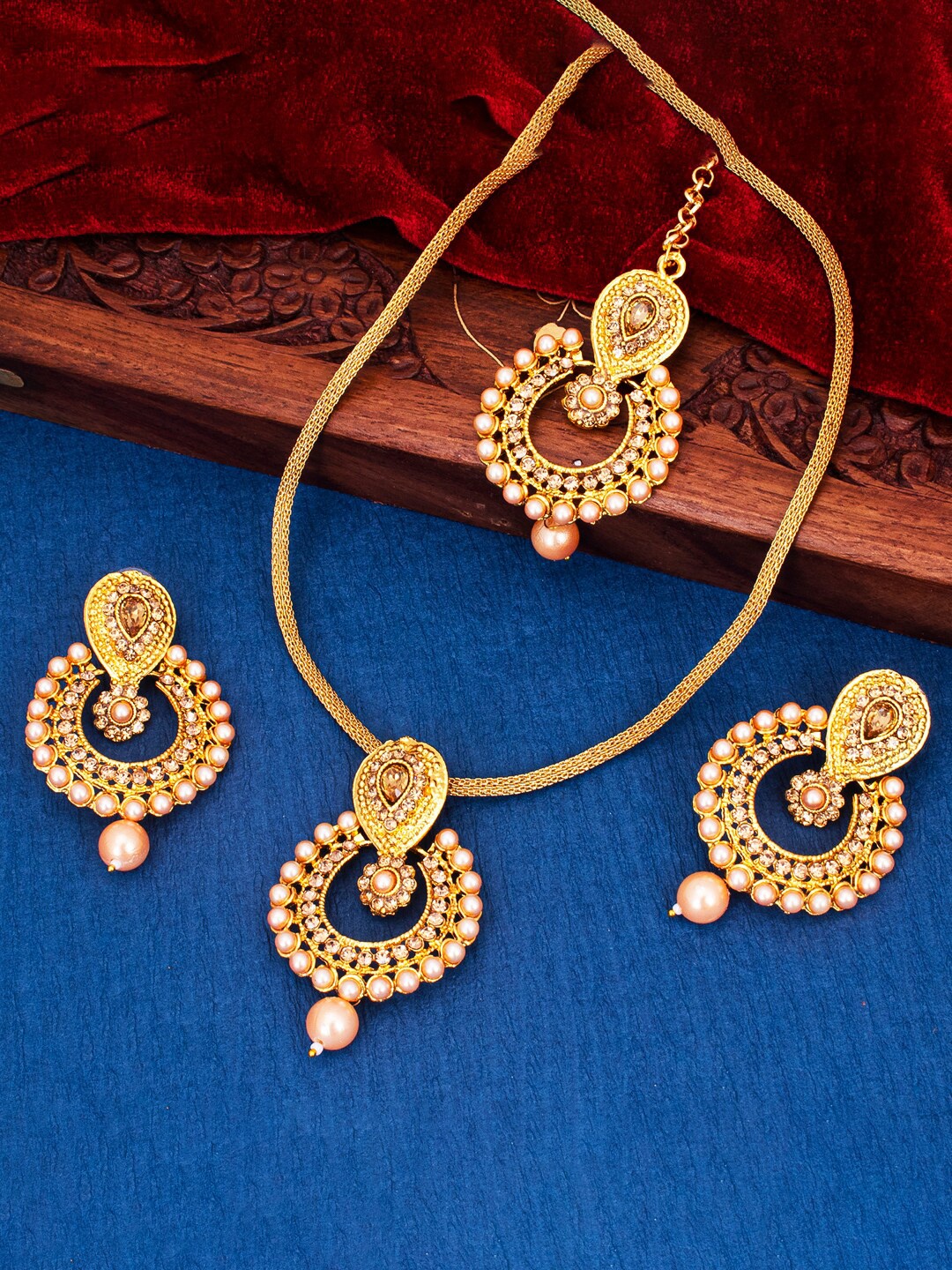 

Sukkhi Gold-Plated Beaded Choker Jewellery Set With Maang Tikka