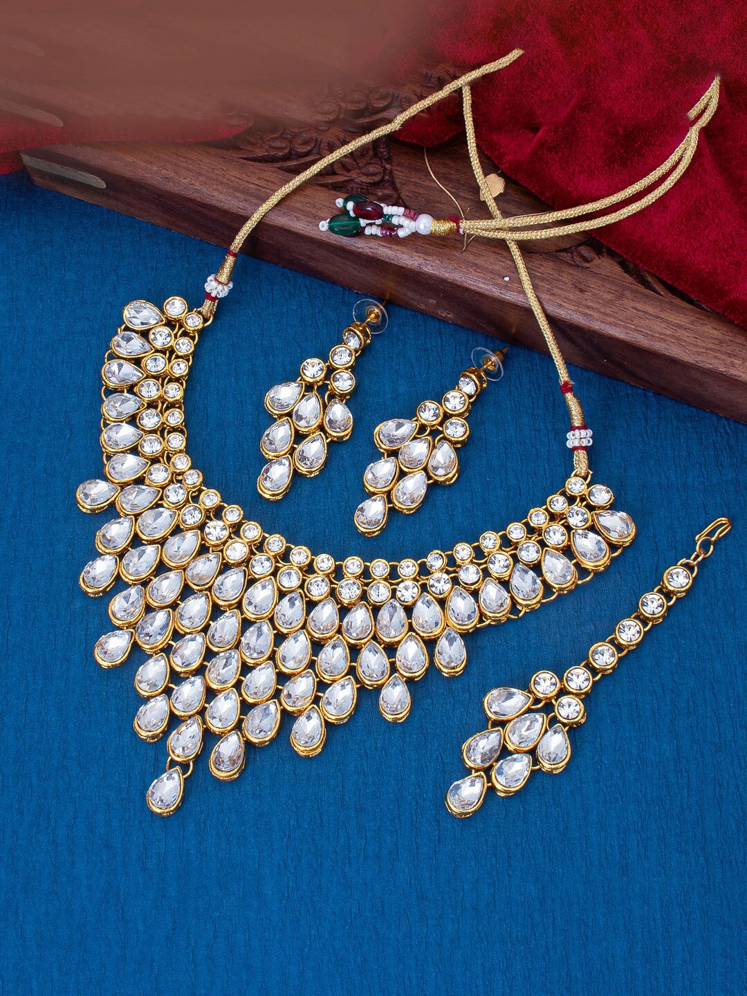 

Sukkhi Gold Plated Stone-Studded Jewellery Set With Maang Tikka