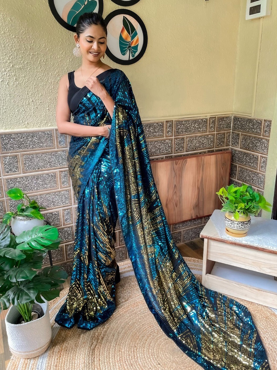 

Mitera Teal blue & Gold-Toned Embellished Sequinned Poly Georgette Saree