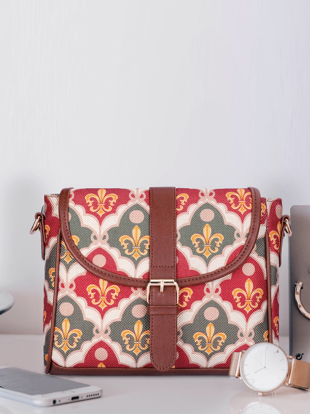 

THE CLOWNFISH Ethnic Motifs Printed Buckle Detail Structured Sling Bag, Red