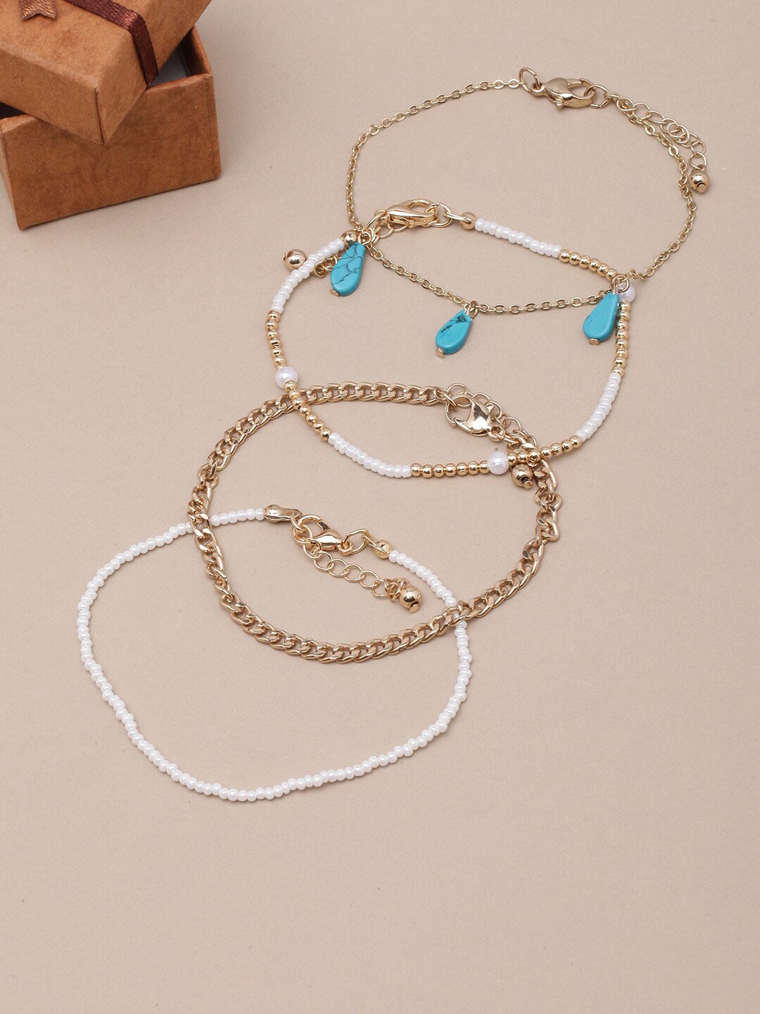 

DIVA WALK Set Of 4 Gold-Plated Beaded Charm Bracelets
