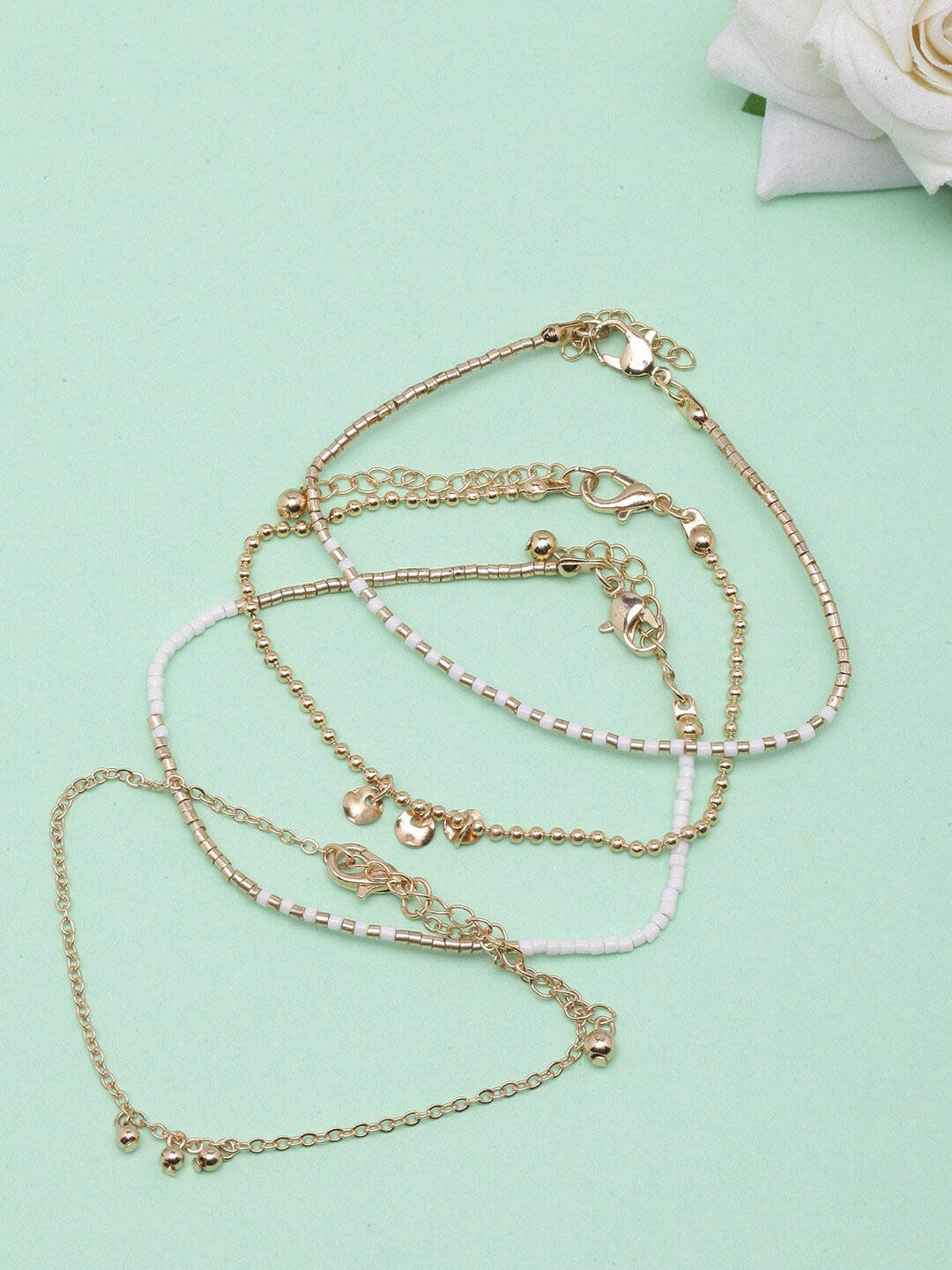 

DIVA WALK Set Of 4 Gold-Plated Beaded Charm Bracelets