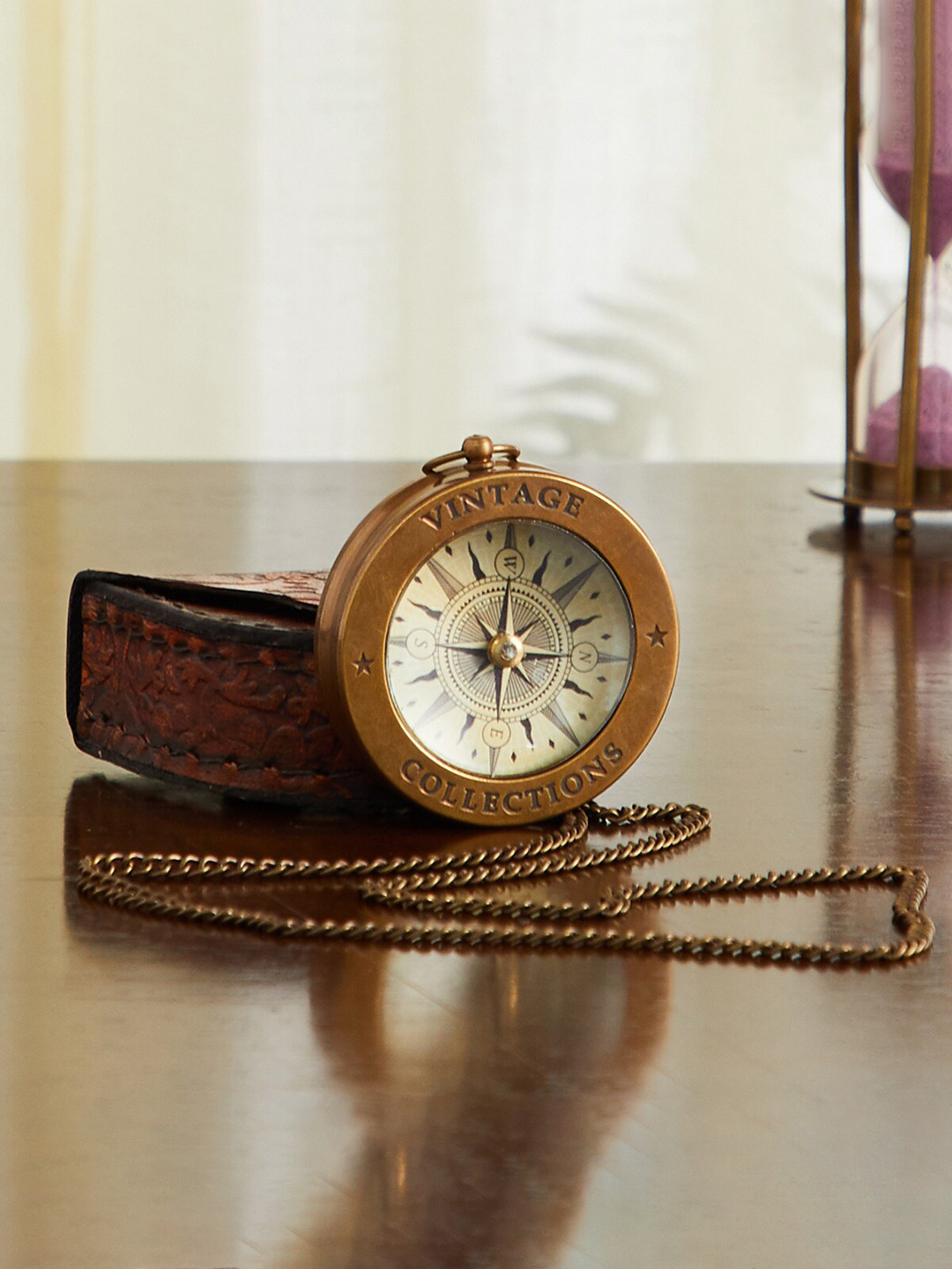 

Home Centre Brown & White Textured Metal Pocket Watch Table Accent