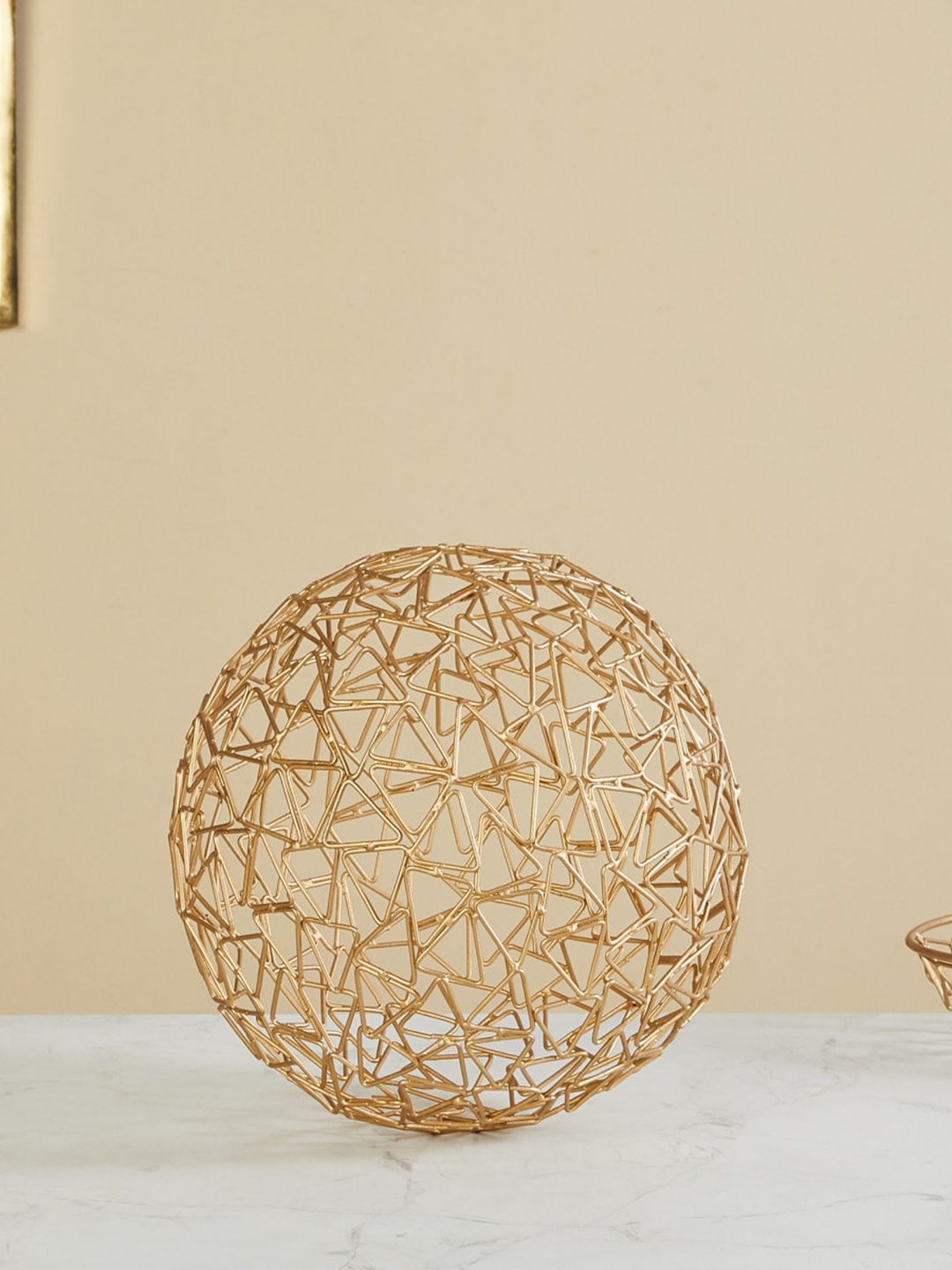 

Home Centre Gold-Toned Wired Ball Table Accent Showpieces