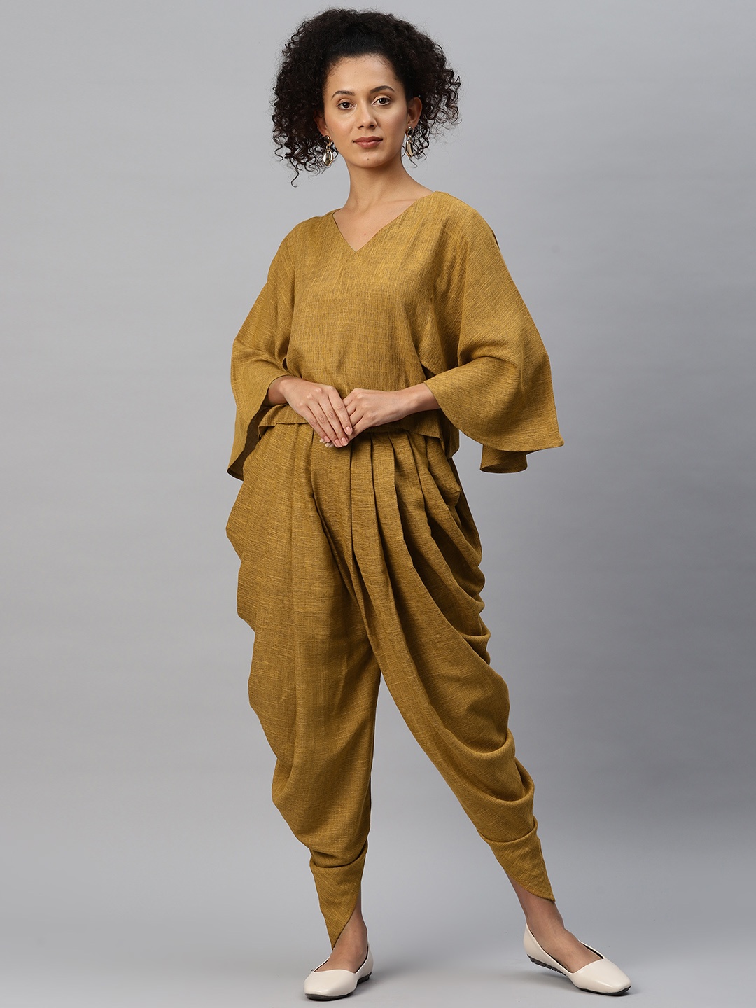 

Cottinfab Solid V-Neck Top with Dhoti Pants, Mustard