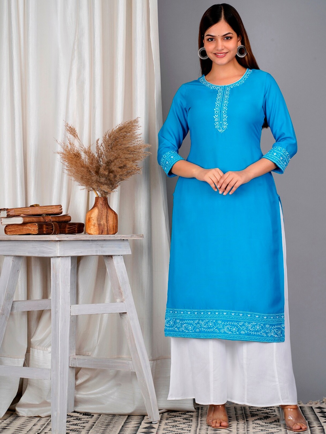 

SkyaSia Ethnic Motif Yoke Design Mirror Work Kurta With Palazzos, Turquoise blue