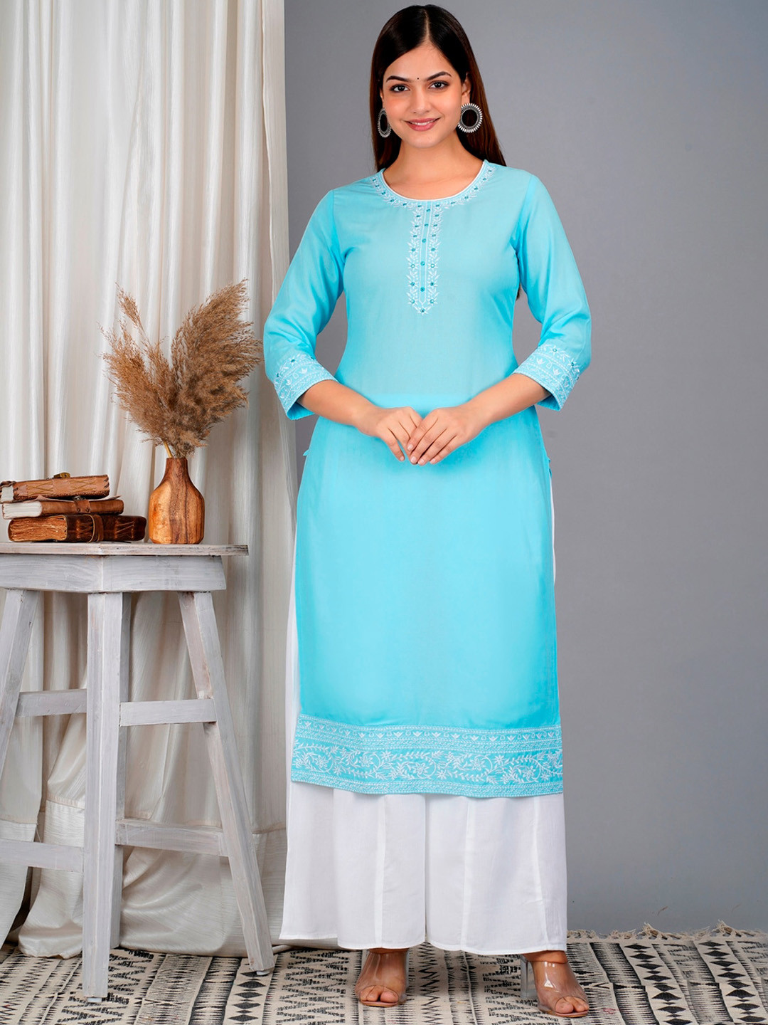 

SkyaSia Ethnic Motif Yoke Design Mirror Work Kurta With Palazzos, Turquoise blue