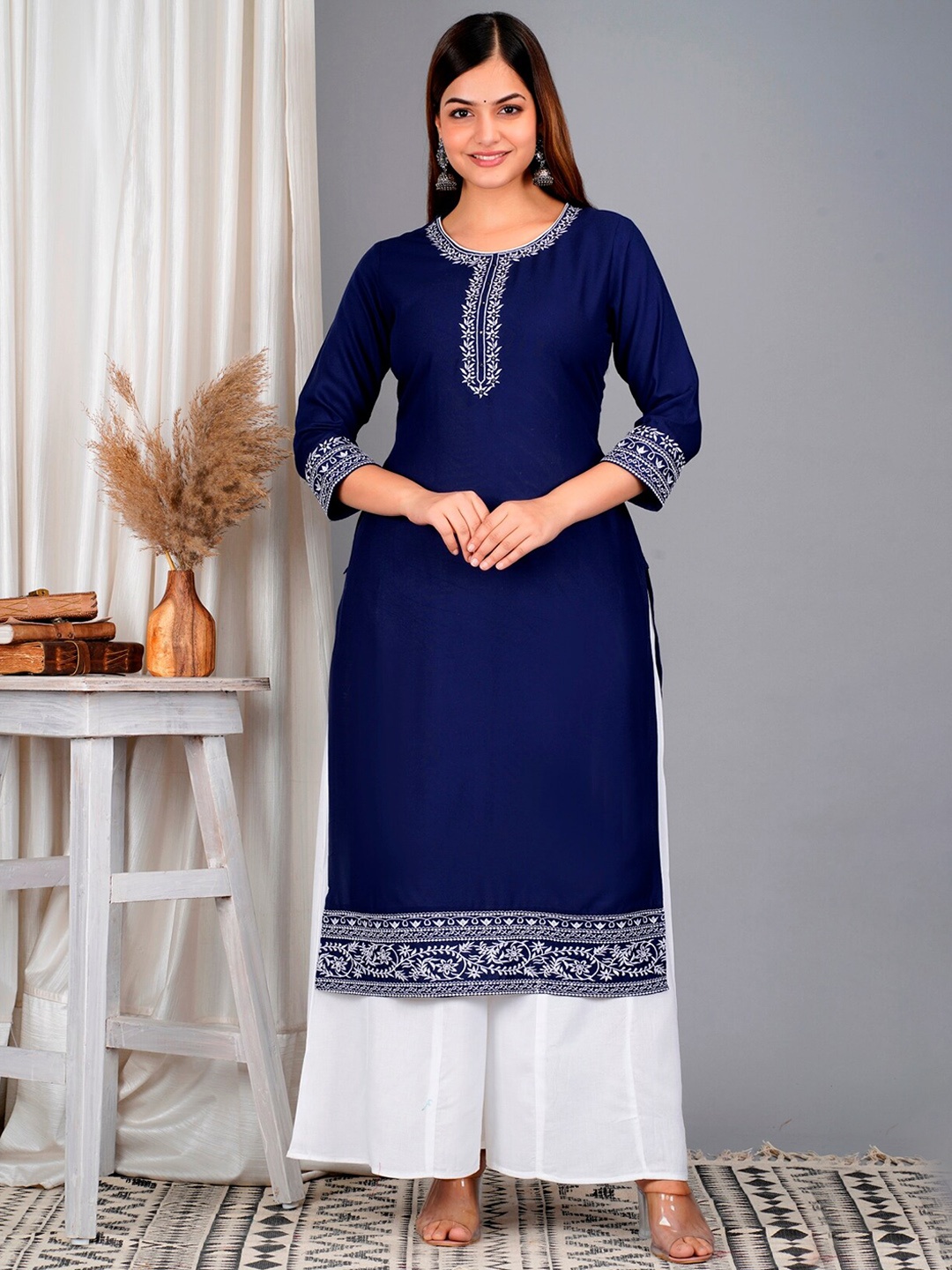 

SkyaSia Ethnic Motif Yoke Design Mirror Work Kurta With Palazzos, Navy blue