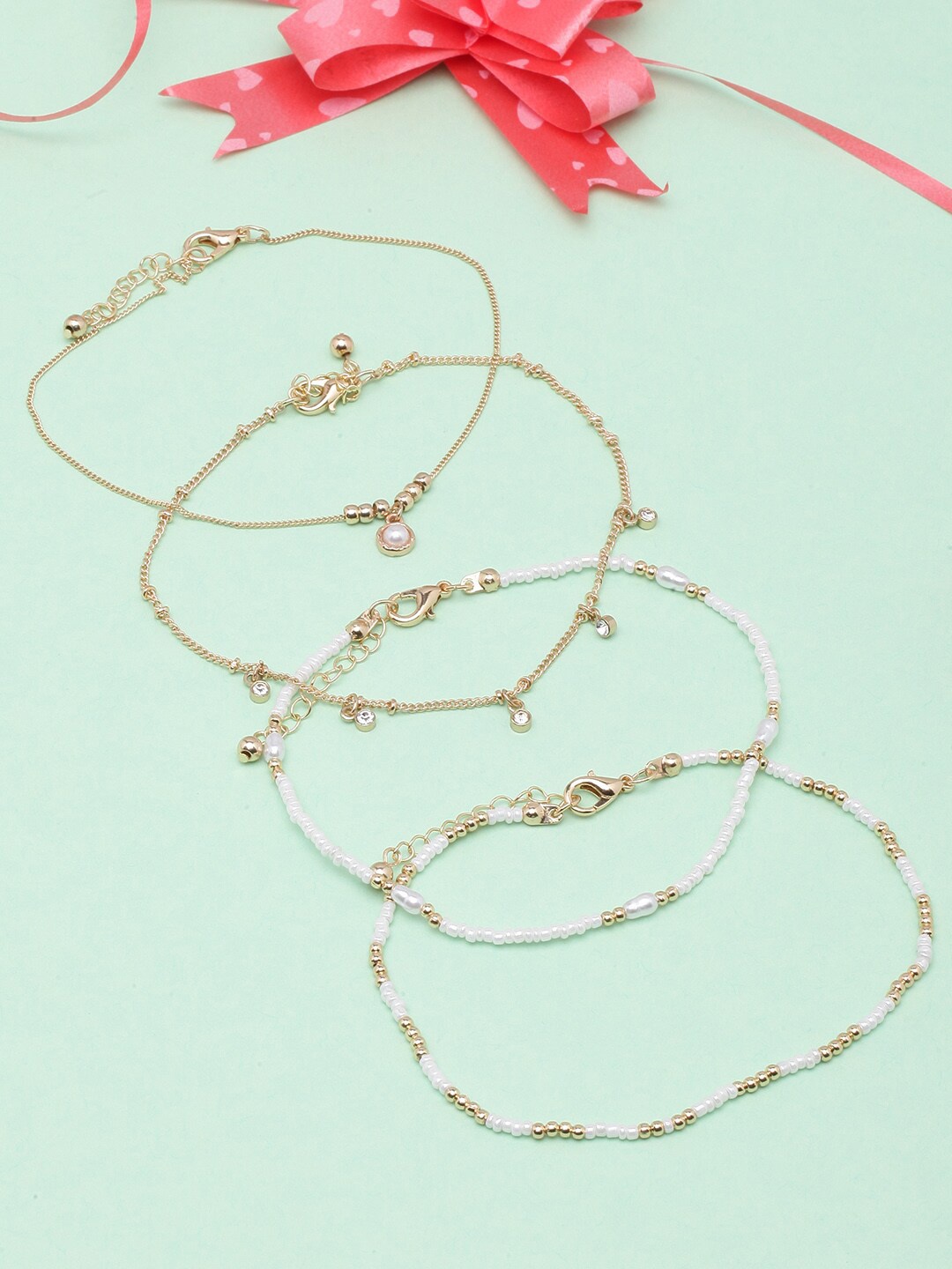

DressBerry White Set Of 4 Gold-Plated Beaded Anklets