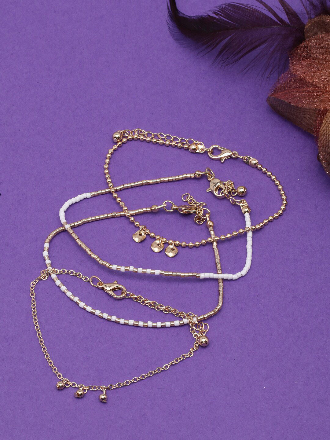 

DressBerry Set Of 4 Gold-Plated Beaded Charm Bracelets