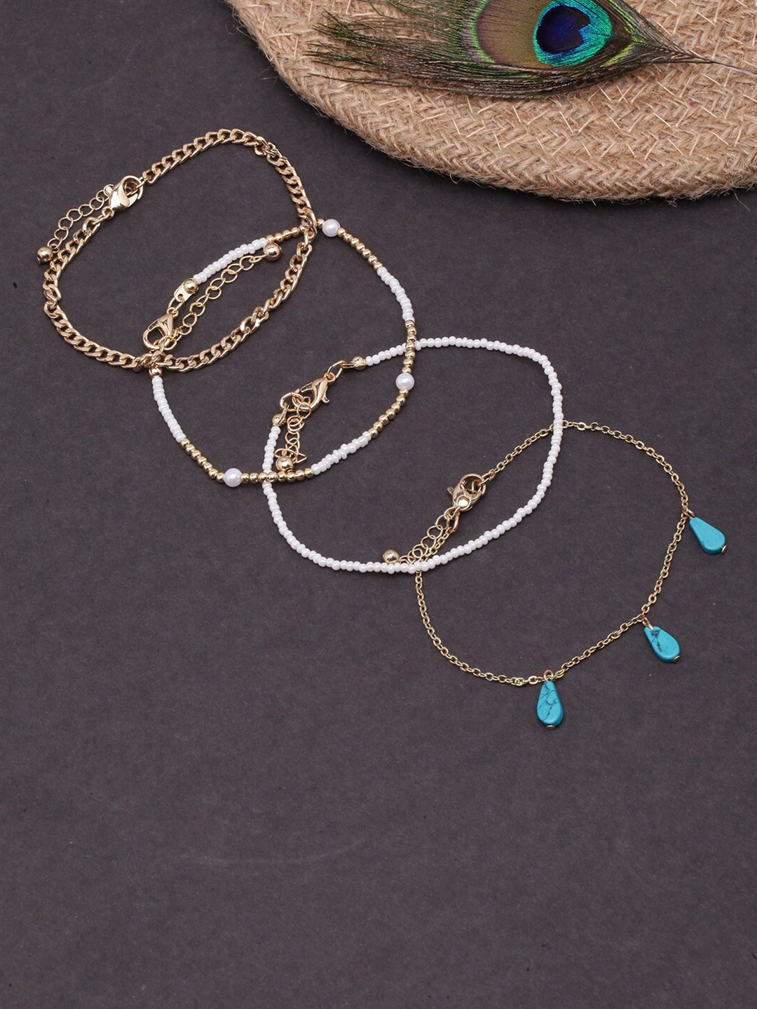 

DressBerry Set Of 4 Gold-Plated Charm Bracelets