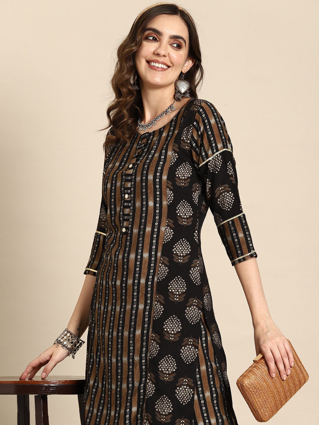 

Sangria Women Ethnic Motifs Printed Regular Kurta with Palazzos, Black