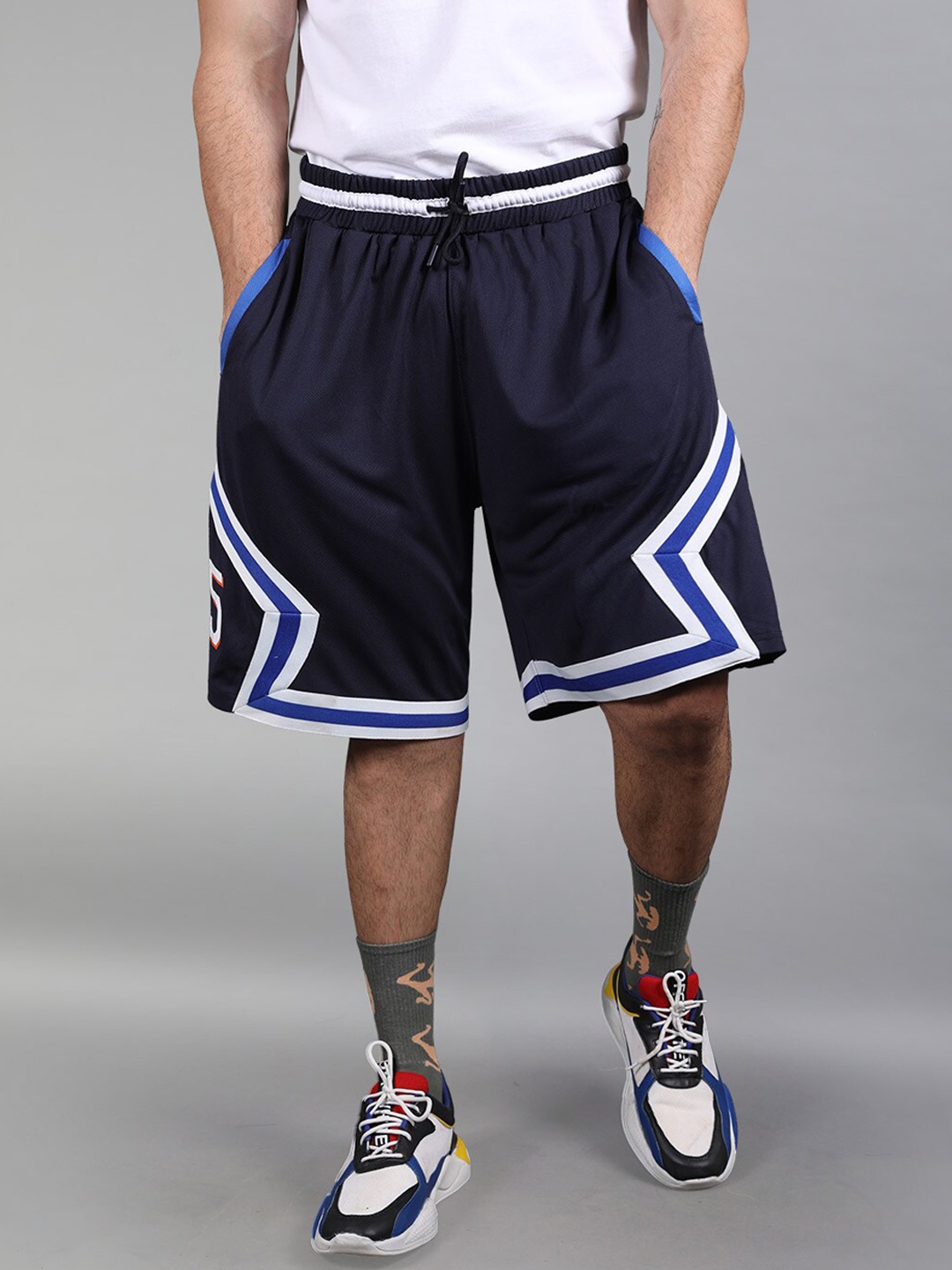 

Shop The Arena Men MI: Cut & Sew Taped Shorts, Navy blue