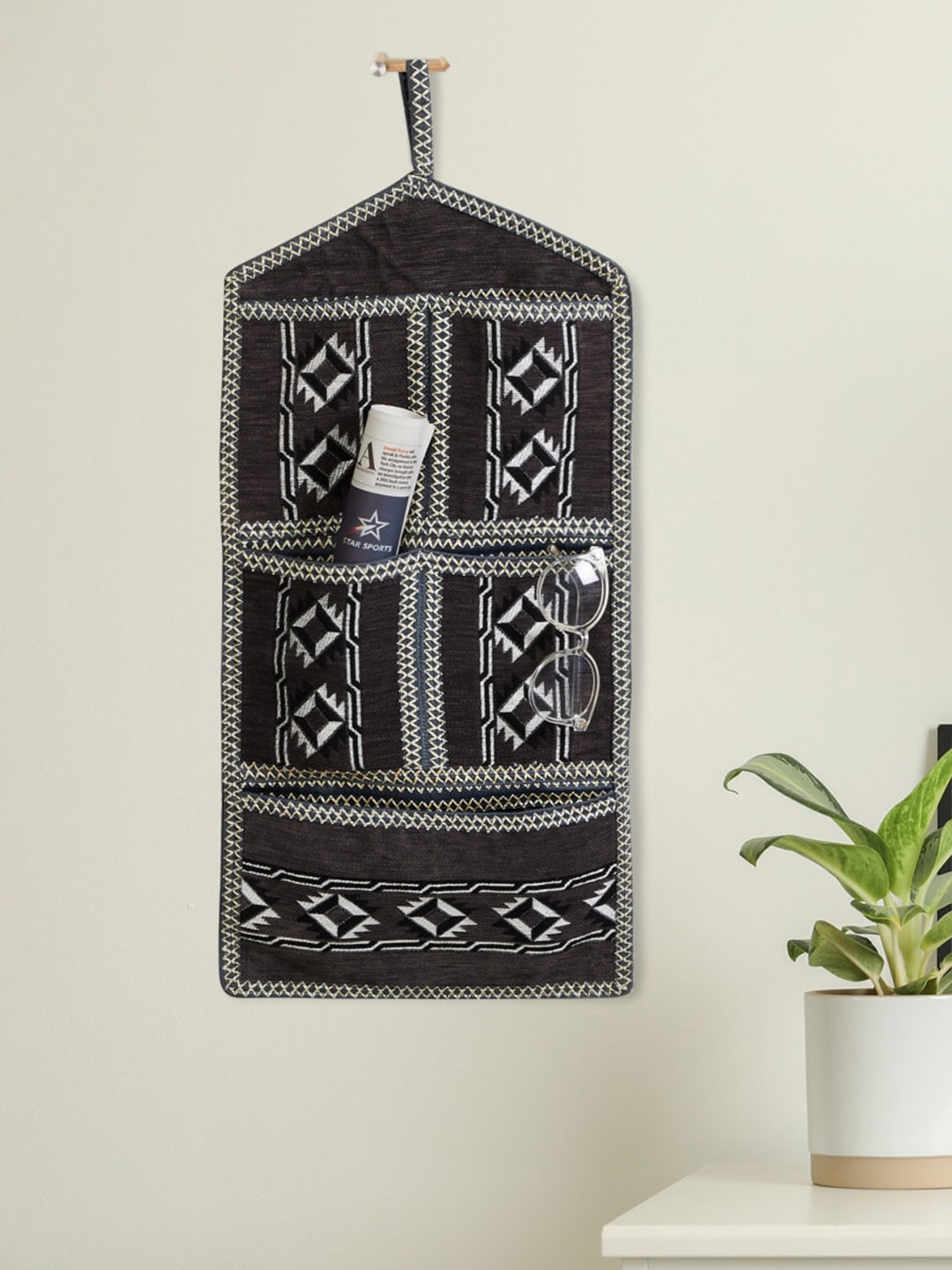 

Home Centre Corsica Grey & White Embroidered Tapestry Wall Hanging With Storage