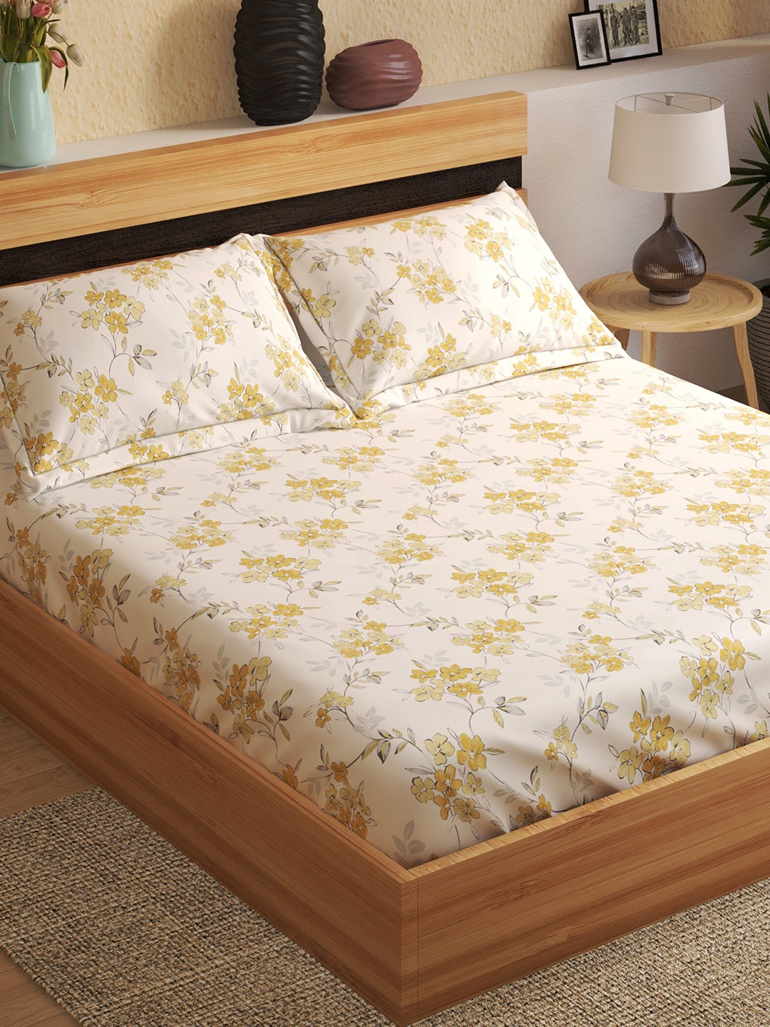 

Home Centre Yellow & Off White Floral 144 TC Cotton Fitted King Bedsheet & 2 Pillow Covers