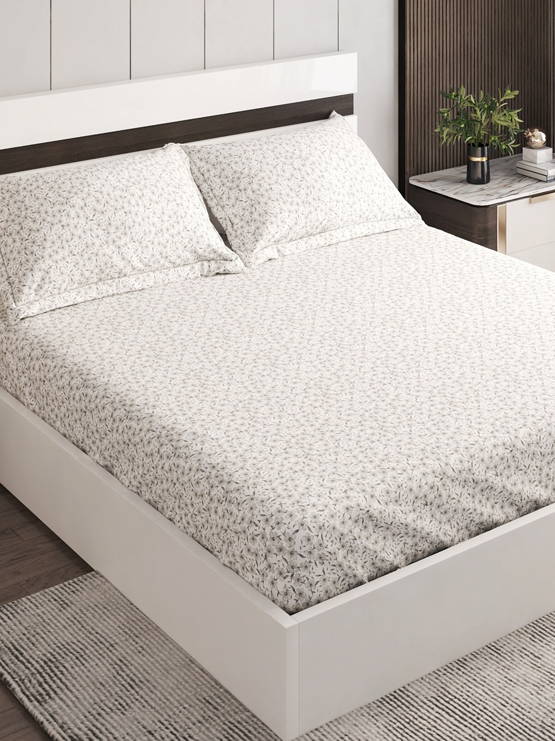 

Home Centre White Floral 144 TC Fitted Cotton Queen Bedsheet with 2 Pillow Covers
