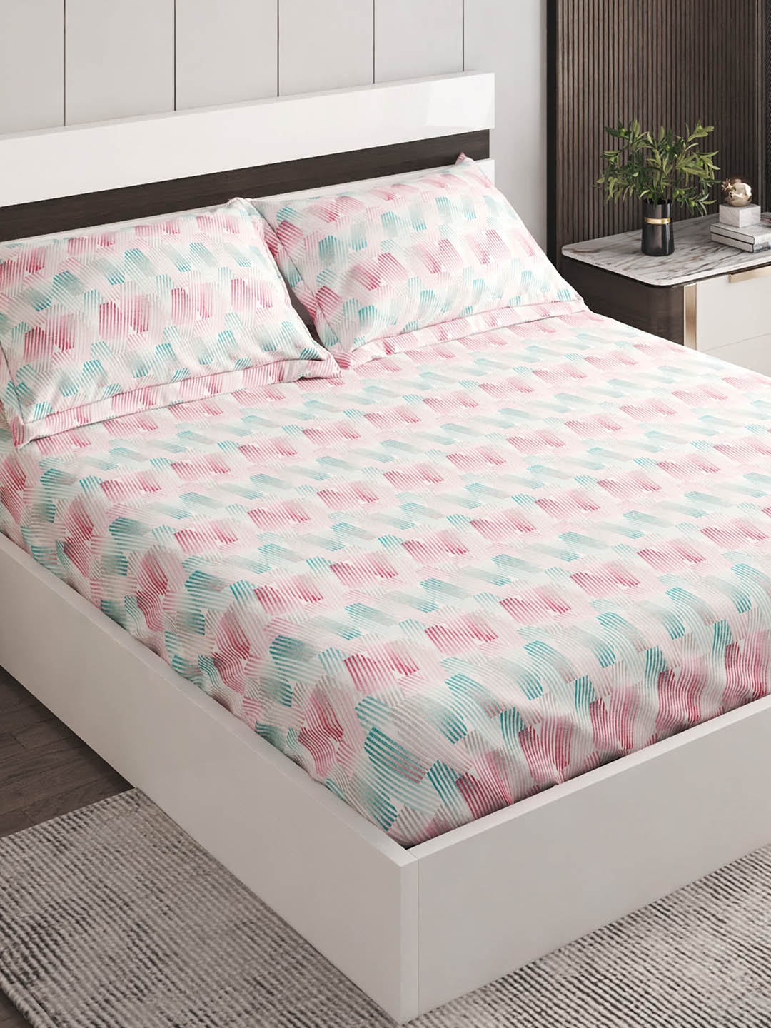 

Home Centre White & Pink Geometric 144 TC Fitted Cotton King Bedsheet with 2 Pillow Covers