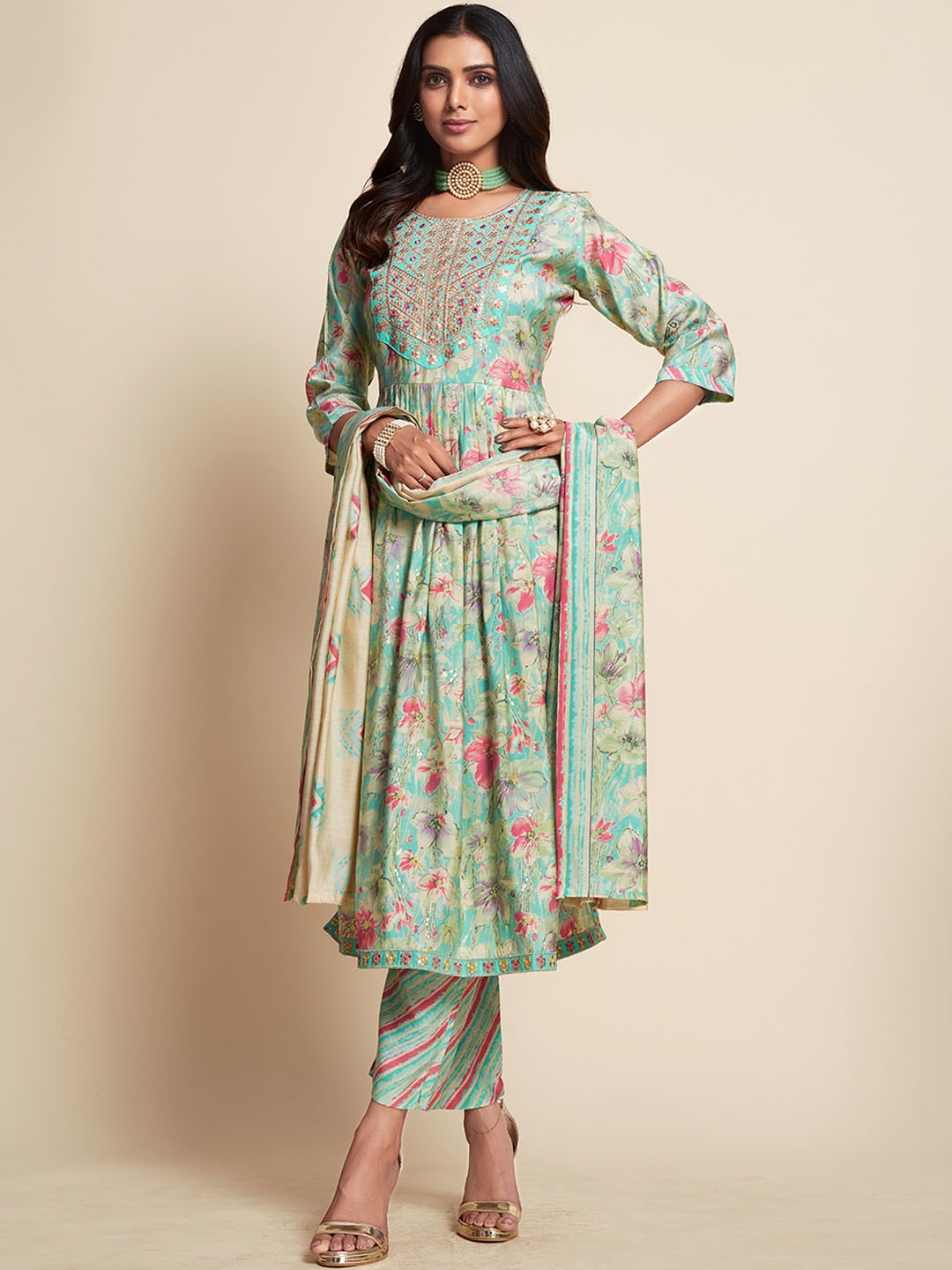 

Ishin Sea Green Floral Printed Pleated Thread Work Kurta with Trousers & With Dupatta