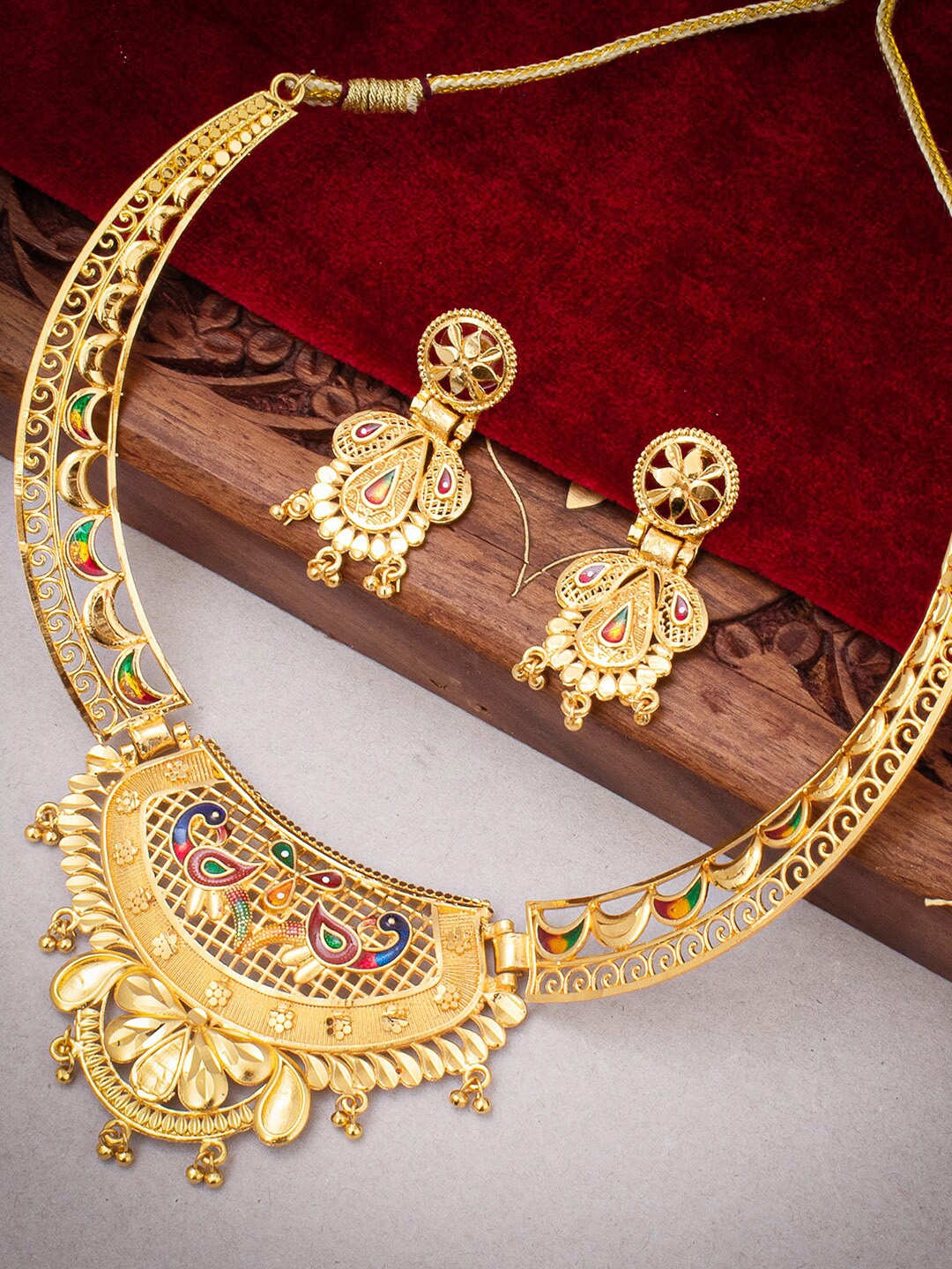 

Sukkhi Gold-Plated Peacock Enamelled Necklace & Earrings