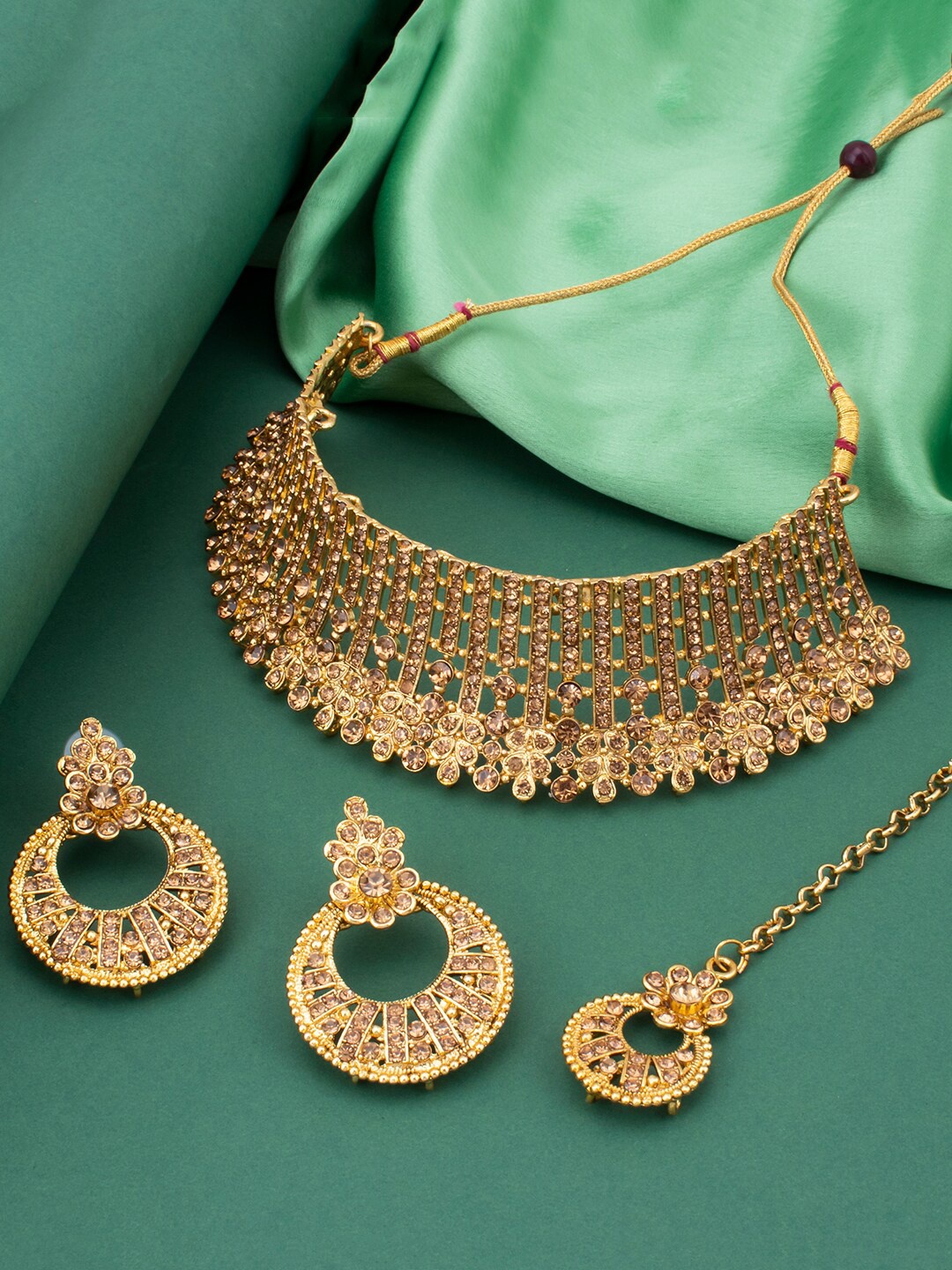 

Sukkhi Gold-Plated Stone-Studded Jewellery Set With Maang Tikka