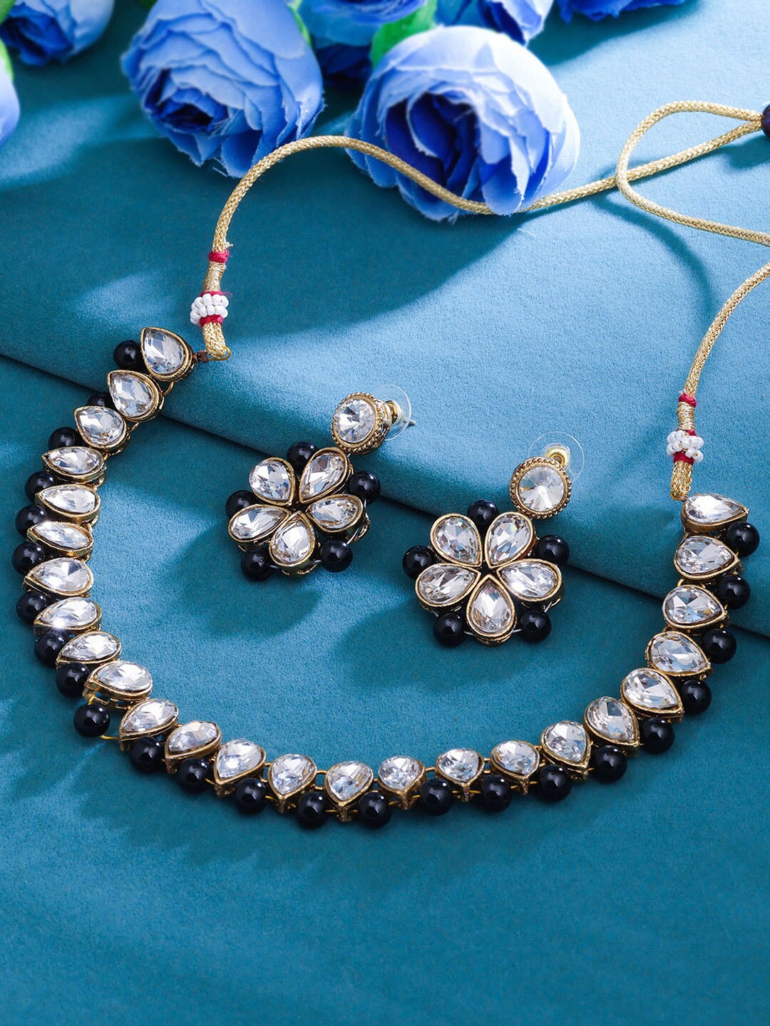 

Sukkhi Gold-Plated Kundan Studded & Beaded Jewellery Set