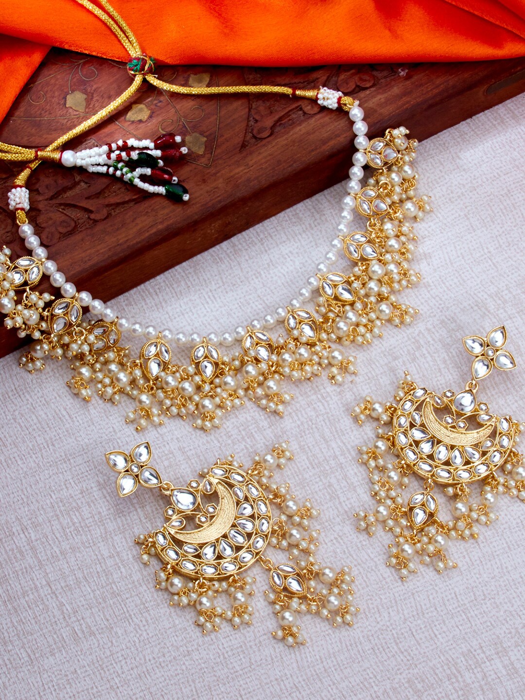 

Sukkhi Gold-Plated Kundan Necklace & Earrings