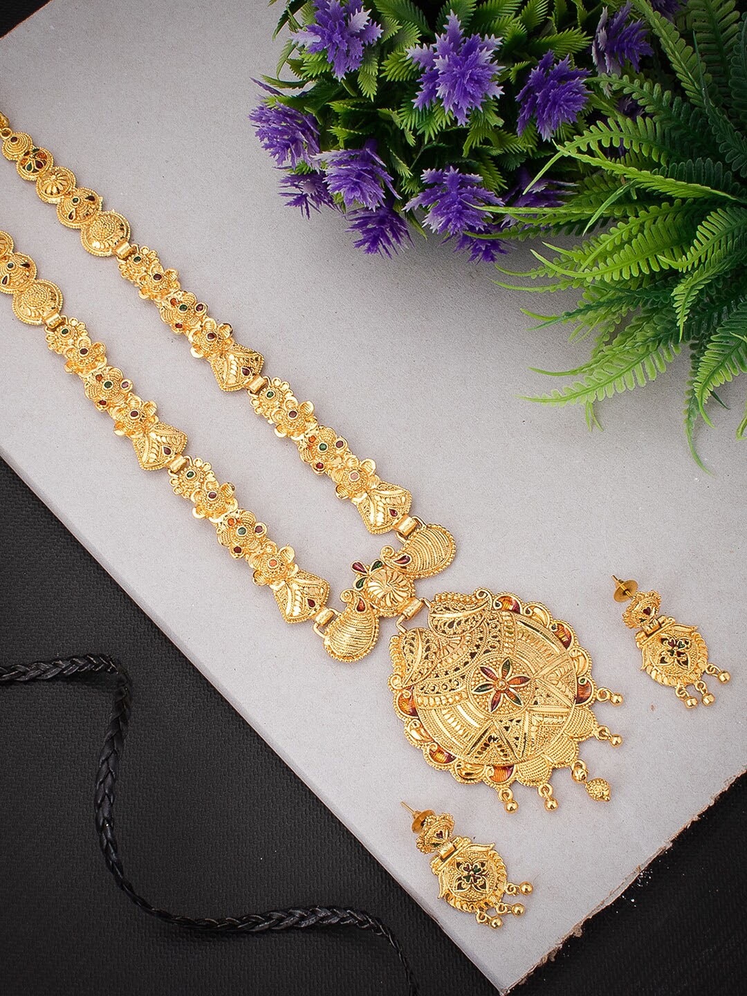 

Sukkhi Gold-Plated Stone-Studded Necklace And Earrings Jewellery Set