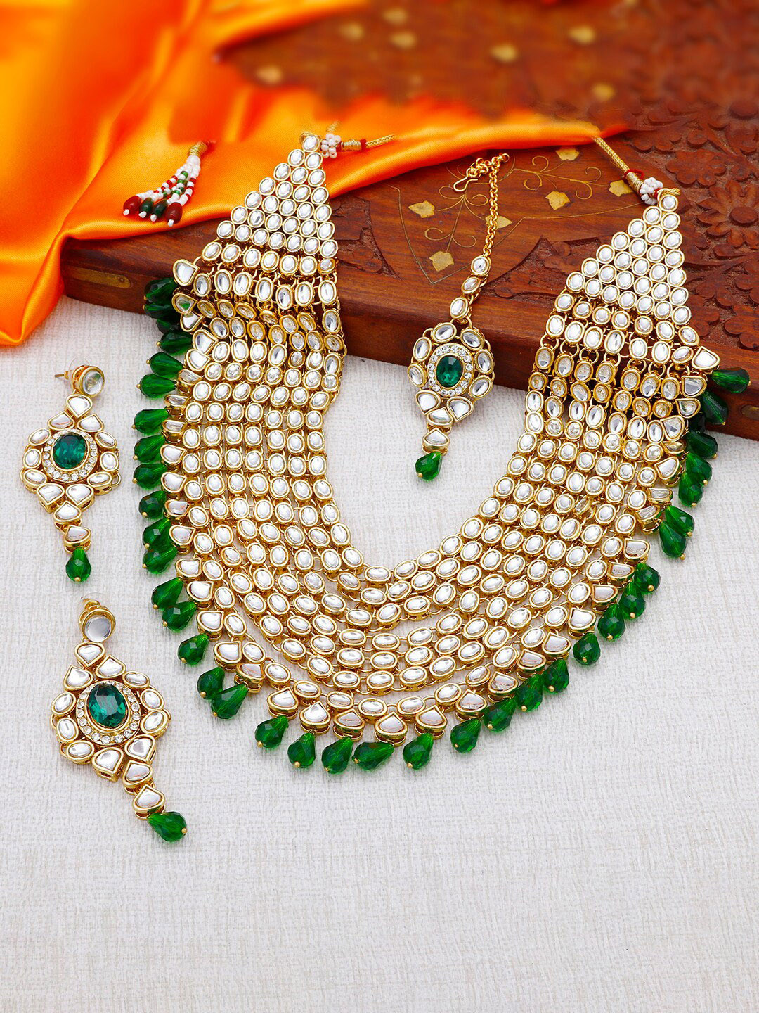 

Sukkhi Gold-Plated Kundan-Studded Necklace and Earrings with Maang Tika