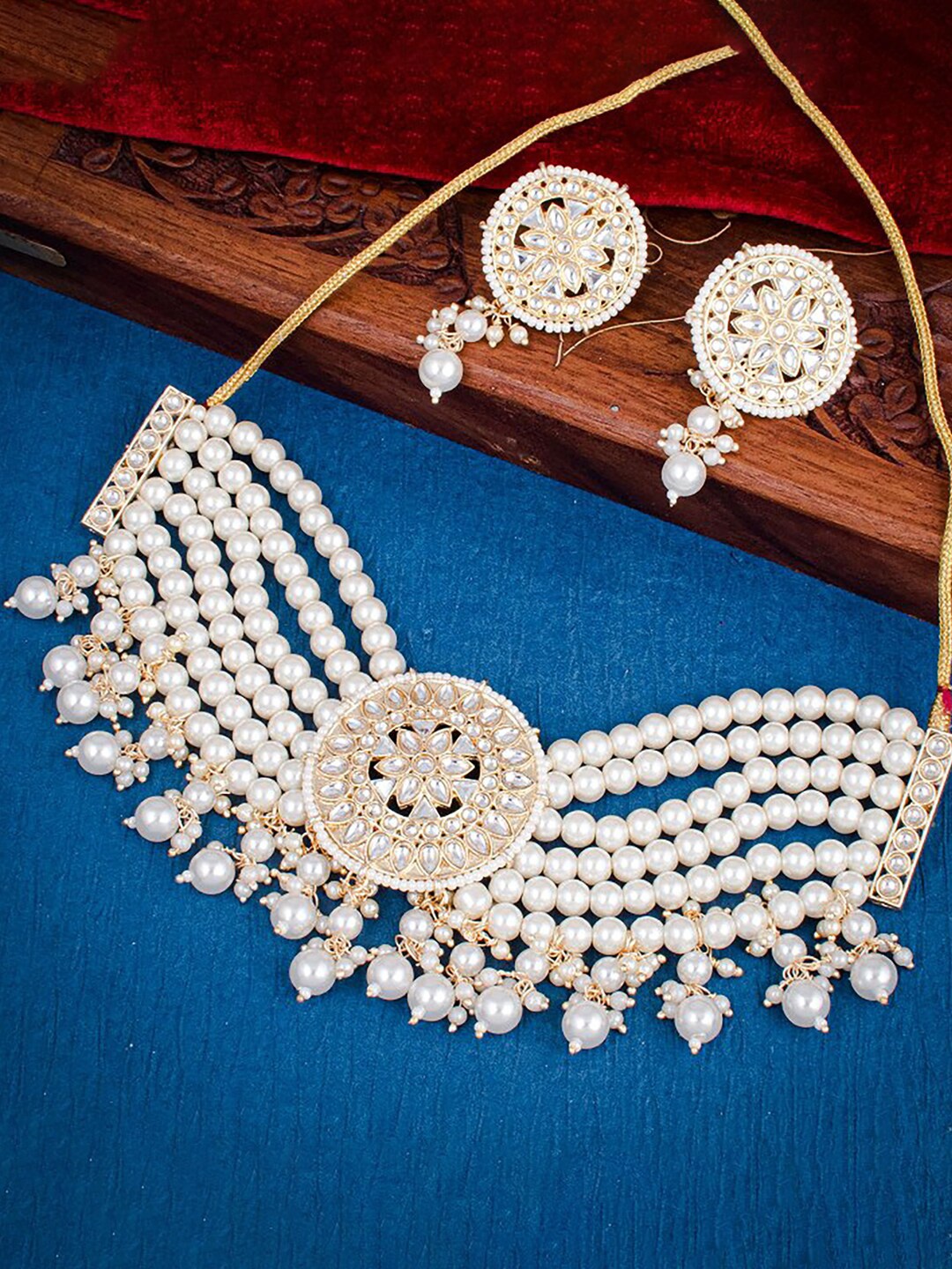 

Sukkhi Gold-Plated Beaded Kundan-Studded Necklace And Earrings Jewellery Set