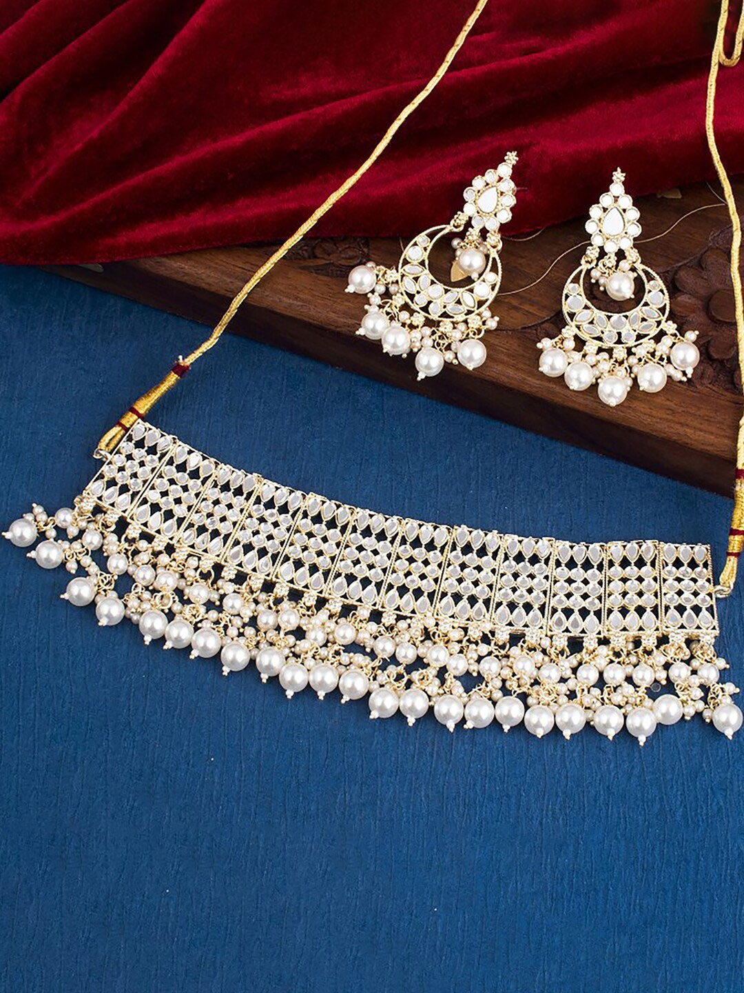 

Sukkhi Gold-Plated Stone-Studded and Beaded Jewellery Set