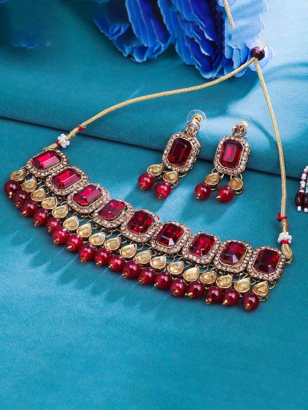 

Sukkhi Gold-Plated Stone-Studded and Beaded Jewellery Set