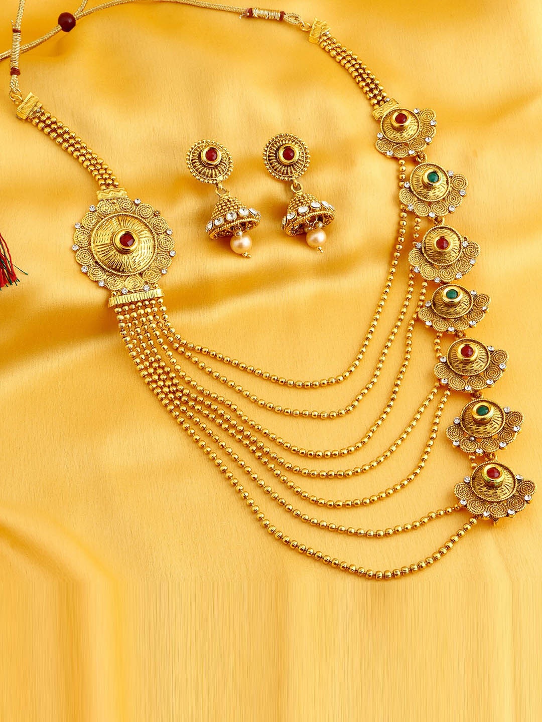 

Sukkhi Gold-Plated Stone-Studded And Beaded 7 String Layered Jewellery Set