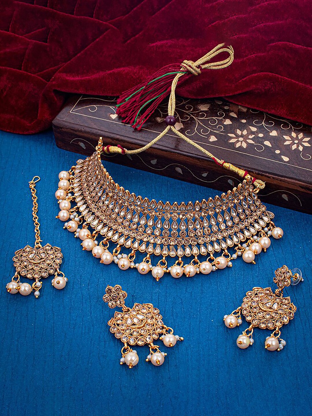 

Sukkhi Gold-Plated Stone-Studded and Beaded Necklace and Earrings with Maang Tika