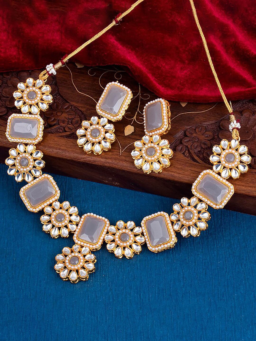 

Sukkhi Gold-Plated Kundan-studded Necklace And Earrings Jewellery Set