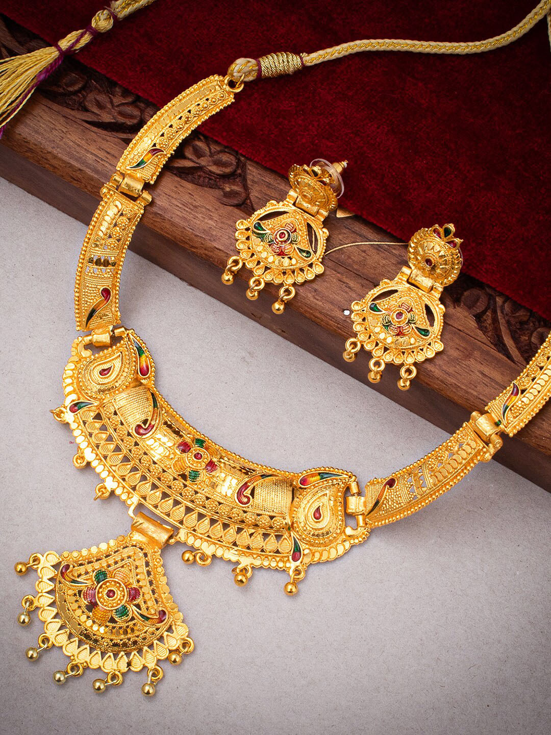 

Sukkhi Gold-Plated Necklace and Earrings Jewellery Set