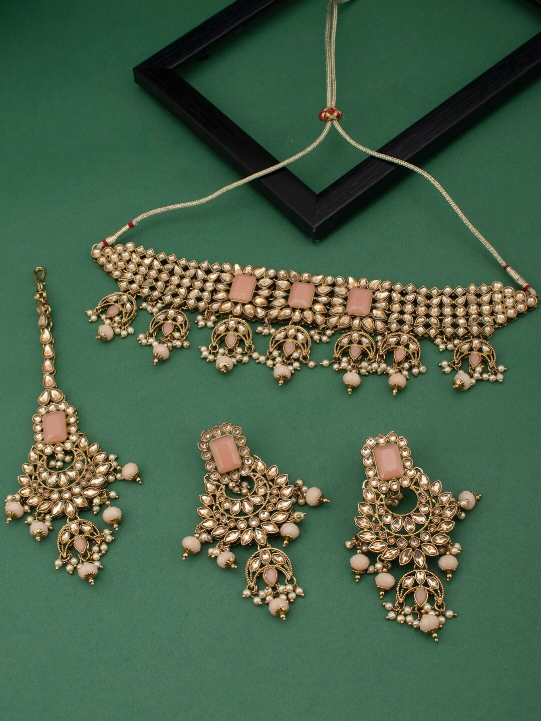 

Sukkhi Gold Plated Stone-Studded & Pearl-Beaded Jewellery Set