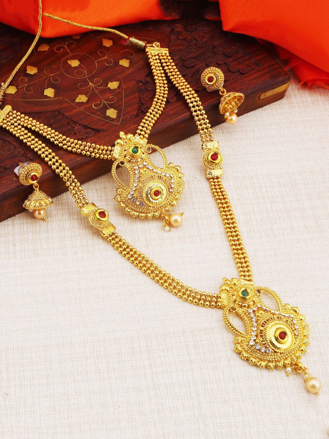 

Sukkhi Gold-Plated Stone-Studded and Beaded Necklace & Earrings Set
