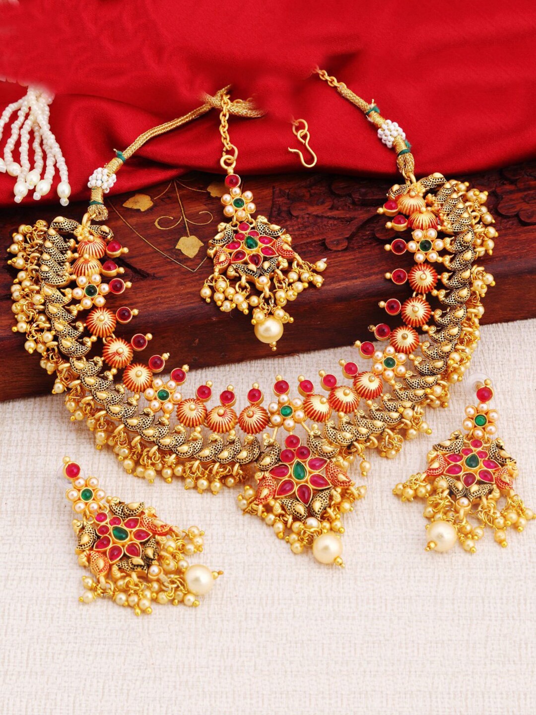 

Sukkhi Gold-Plated Stone-Studded and Beaded Jewellery Set